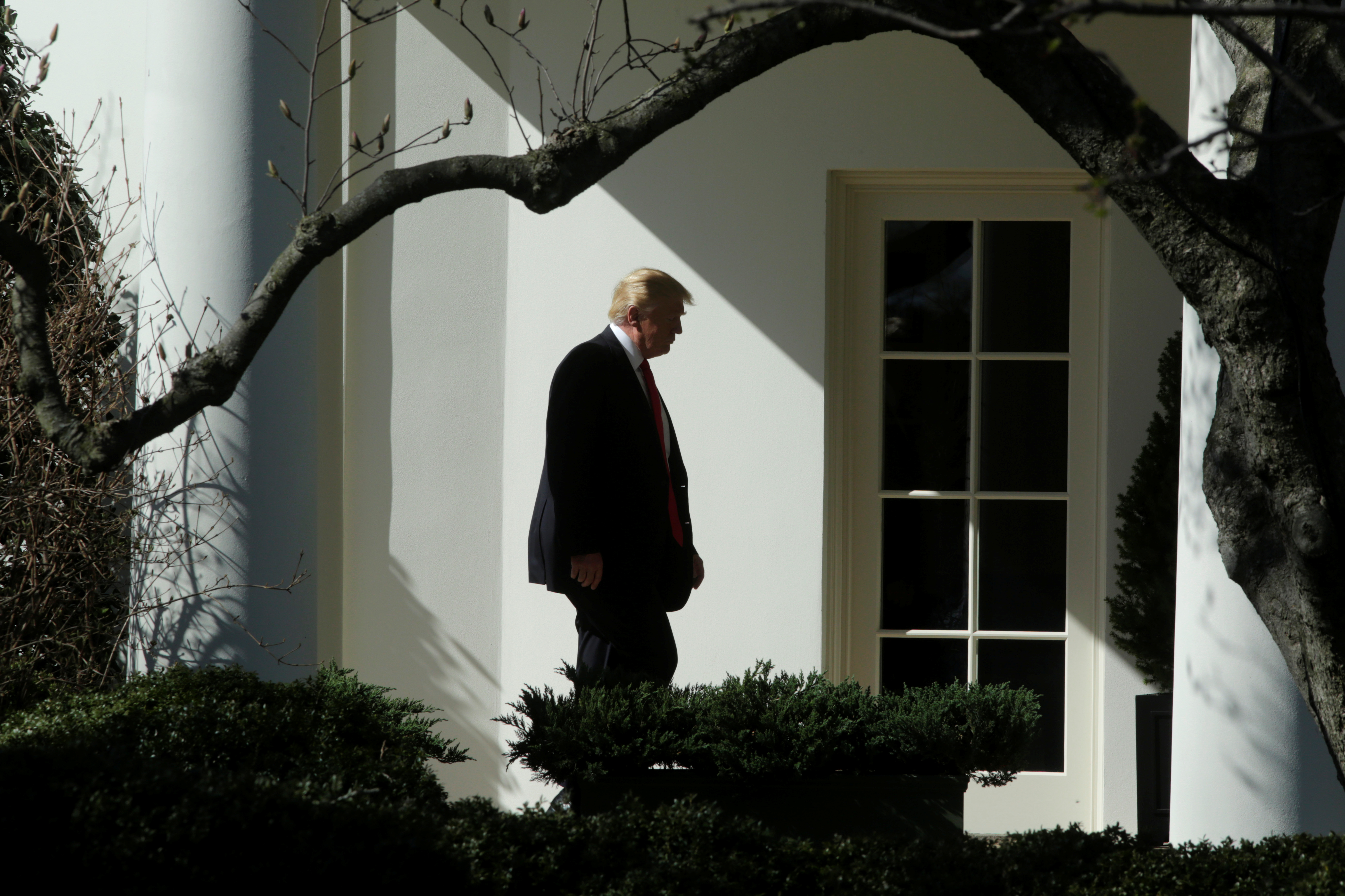 President Donald Trump walks to the Oval Office of the White House in Washington, Feb. 24, 2017.