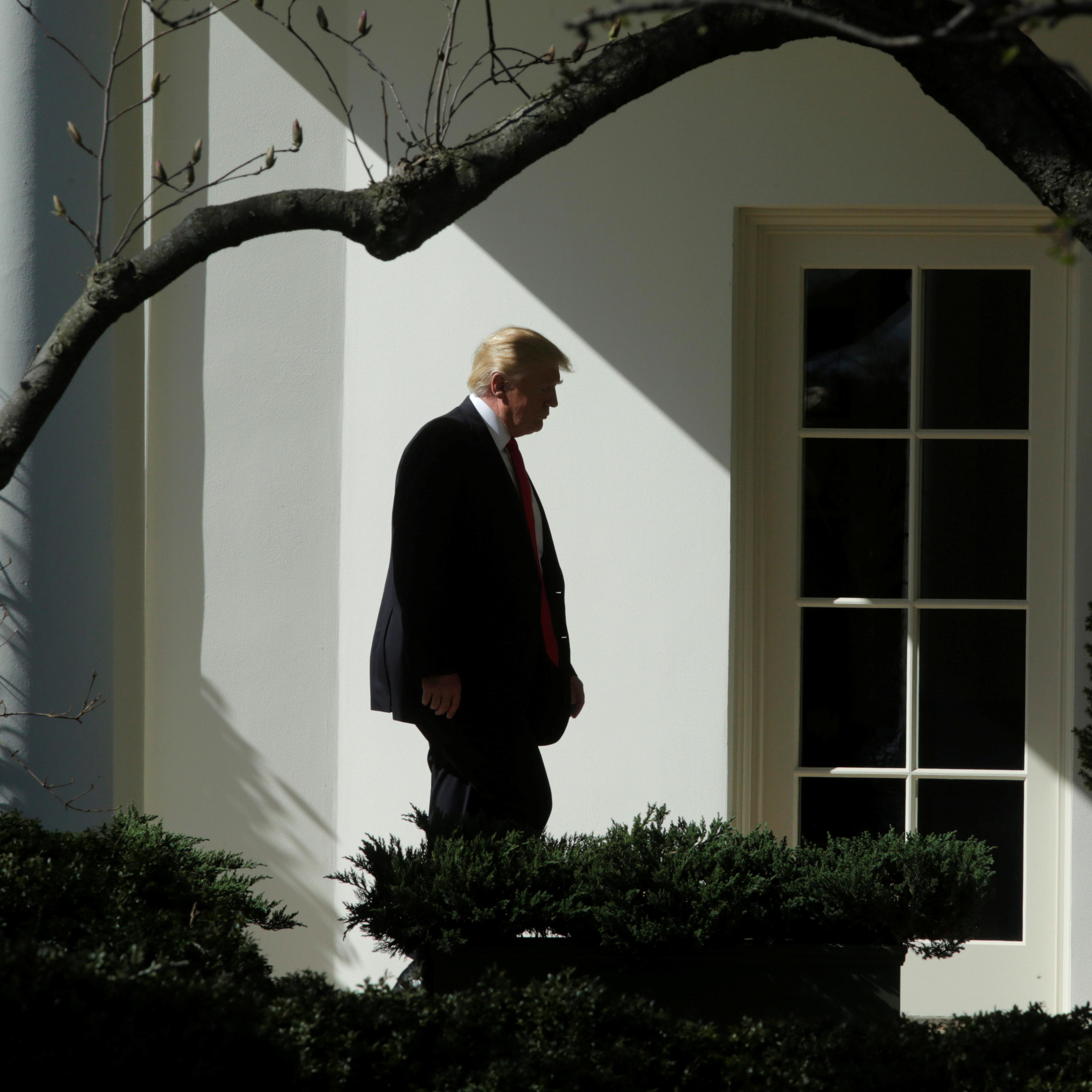 President Donald Trump walks to the Oval Office of the White House in Washington, Feb. 24, 2017.