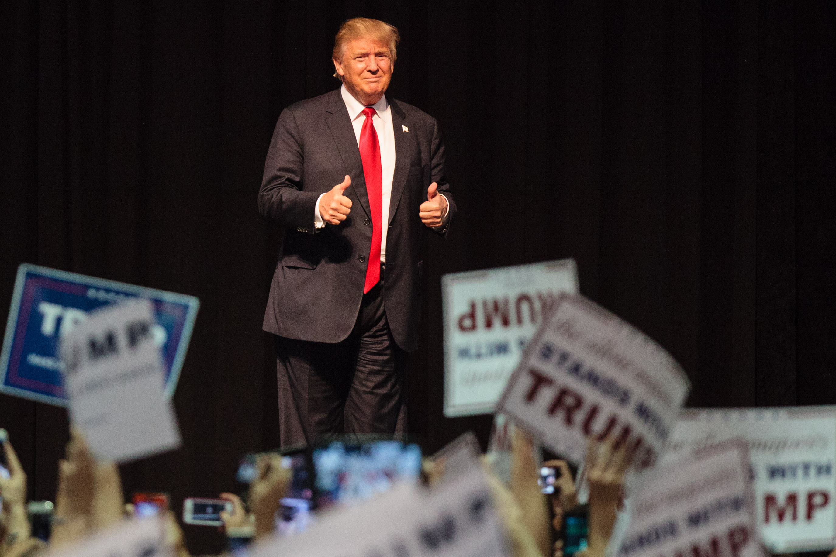 US Republican presidential candidate Donald Trump gestures to supporters during a rally in Eugene, Ore., on May 6, 2016.