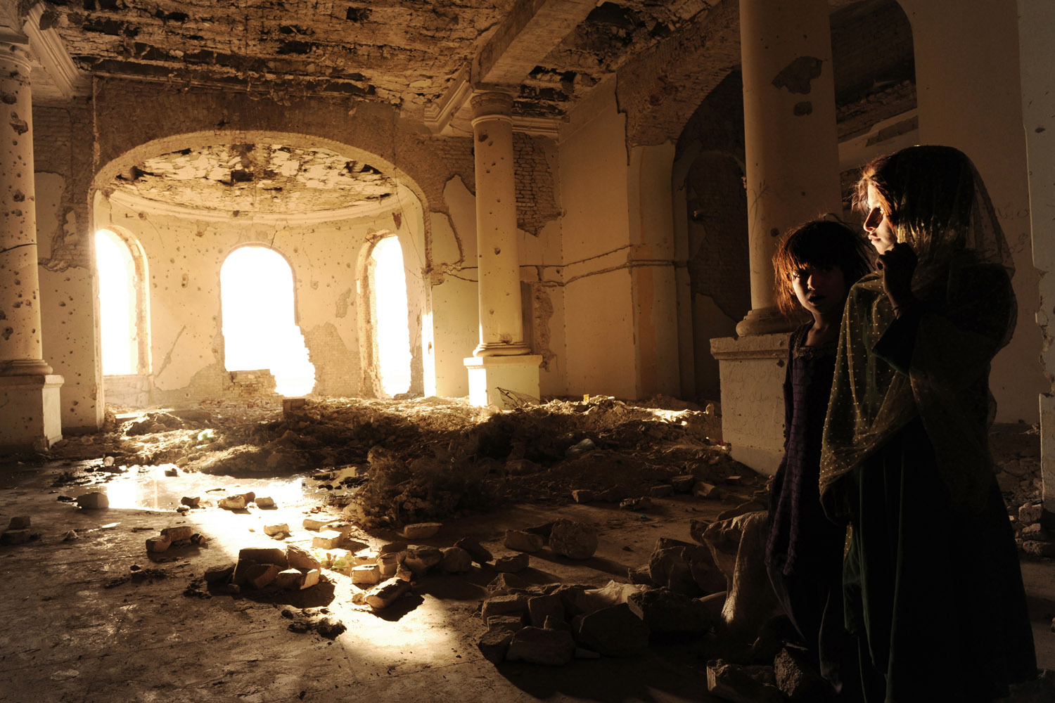 The nomadic Kuchi people seek refuge in the ruins of Darulaman Palace in Kabul, Afghanistan, after violent ethnic disputes with the Hazaras, October 17, 2010.