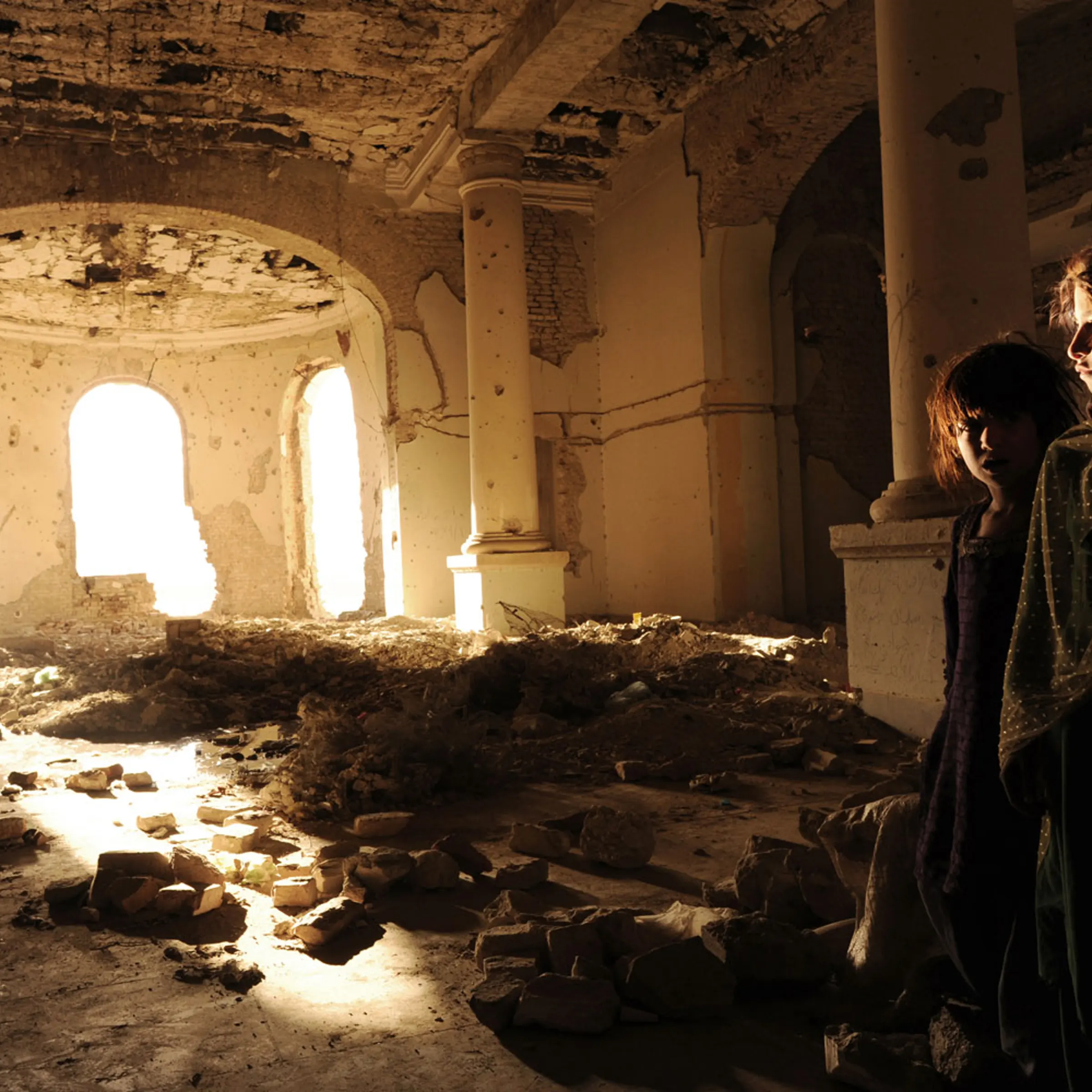 The nomadic Kuchi people seek refuge in the ruins of Darulaman Palace in Kabul, Afghanistan, after violent ethnic disputes with the Hazaras, October 17, 2010.