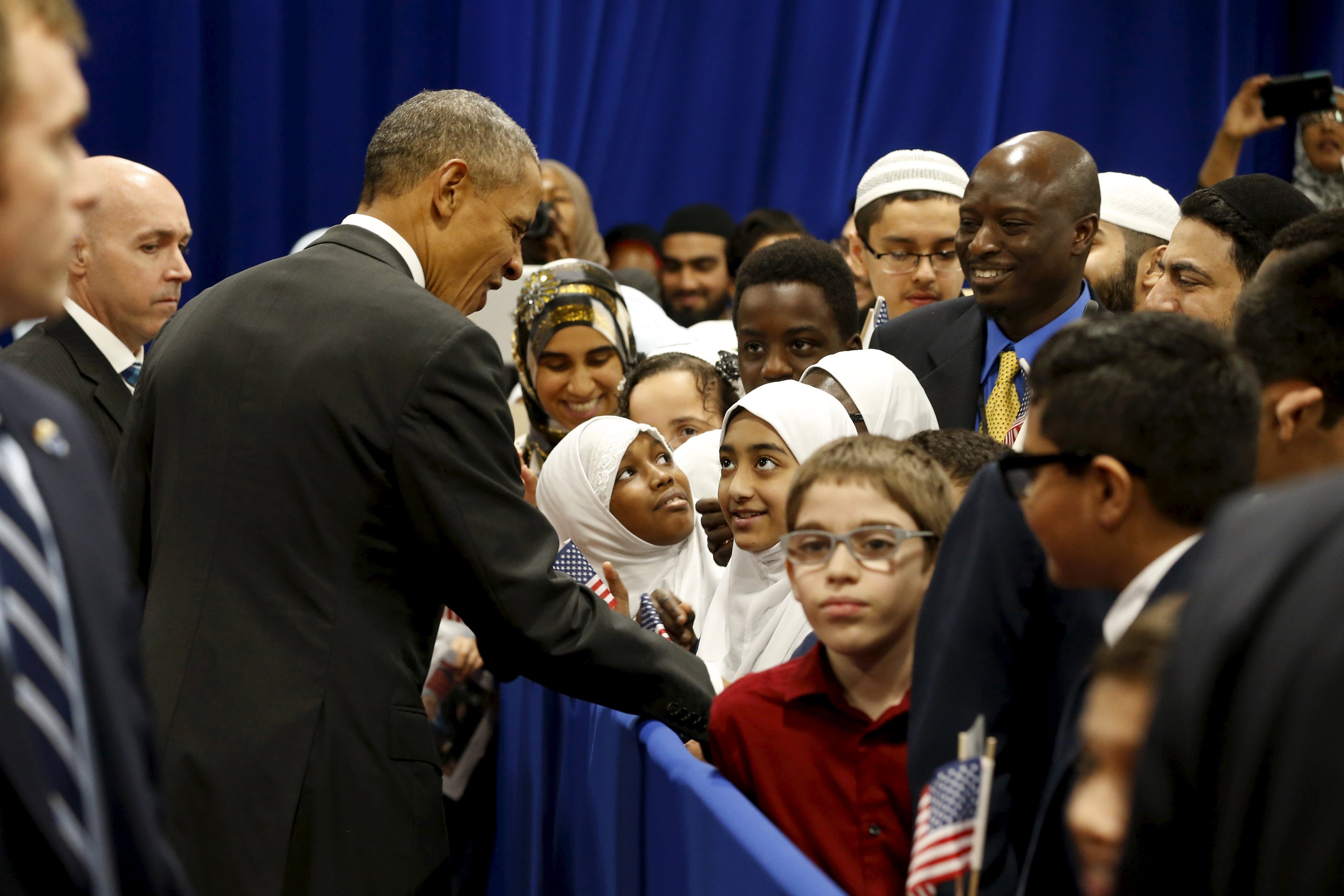 Obama greets students after his remarks at the Islamic Society of Baltimore mosque in Catonsville, Maryland