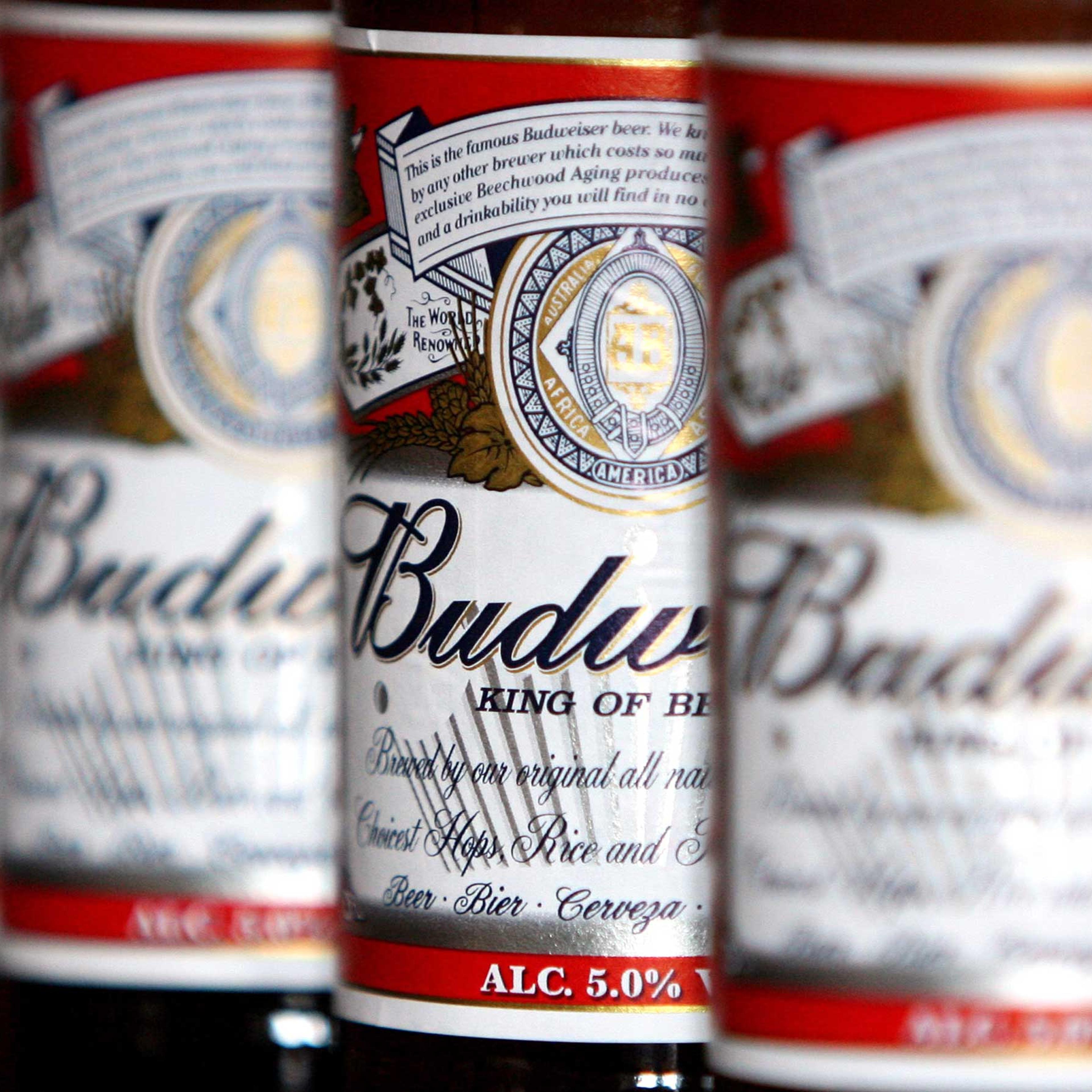 Bottles of Budweiser beer sit on display at a pub in Hornchu