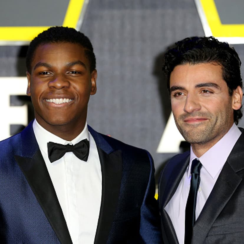 John Boyega and Oscar Isaac attend the European Premiere of 'Star Wars: The Force Awakens' at Leicester Square on December 16, 2015 in London, England.