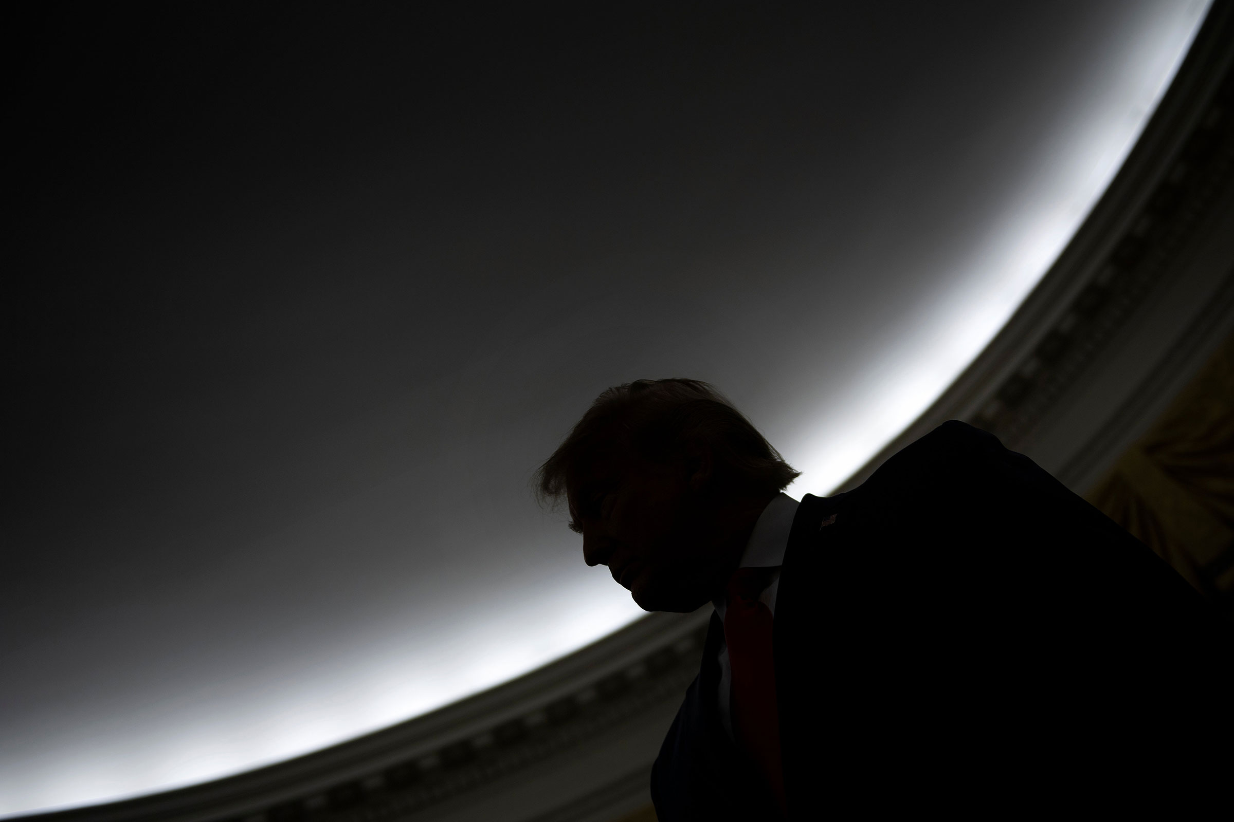 President Donald Trump is seen during a Medal of Freedom ceremony for Lou Holtz in the Oval Office of the White House House on Dec. 3, 2020, in Washington.
