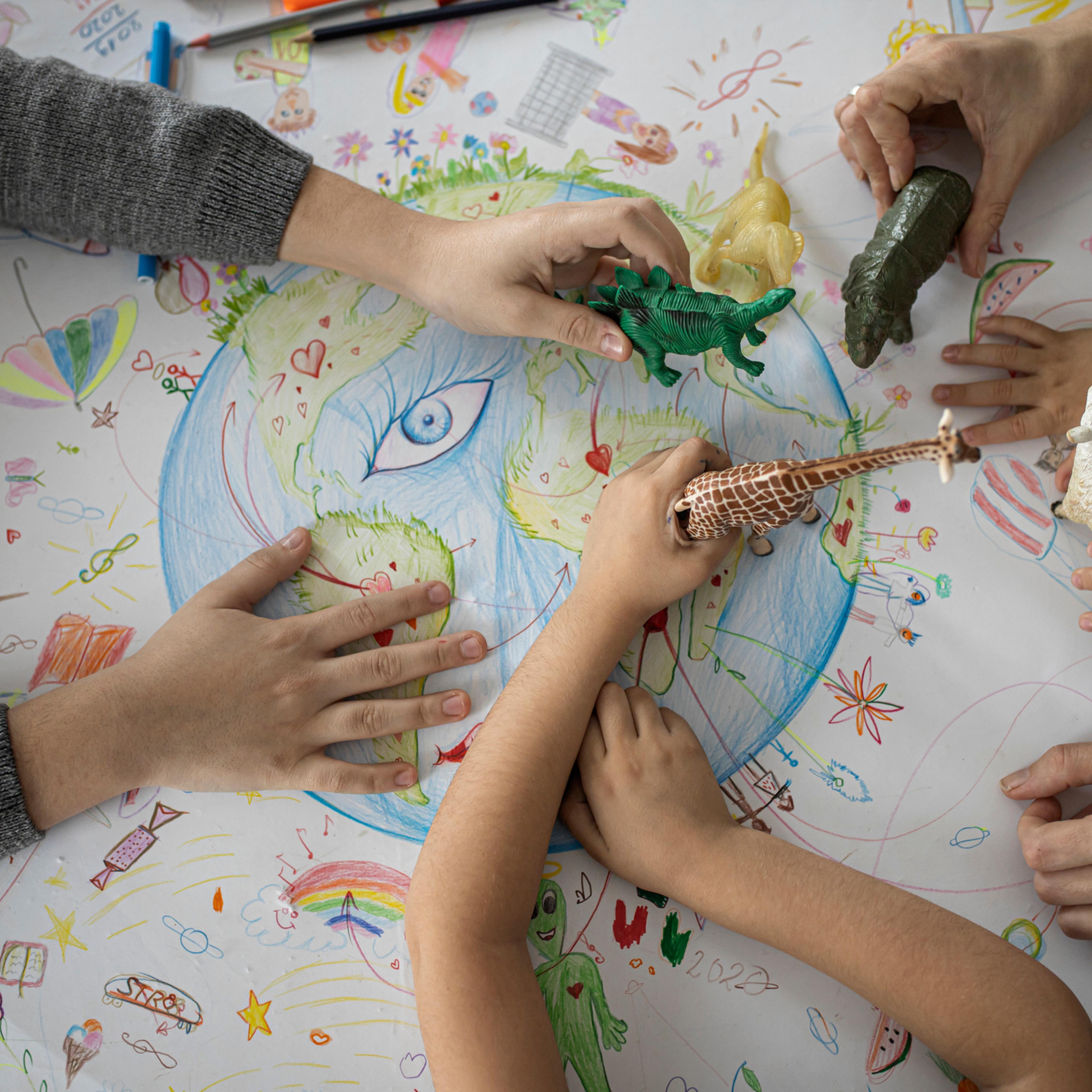 Hands playing with toys