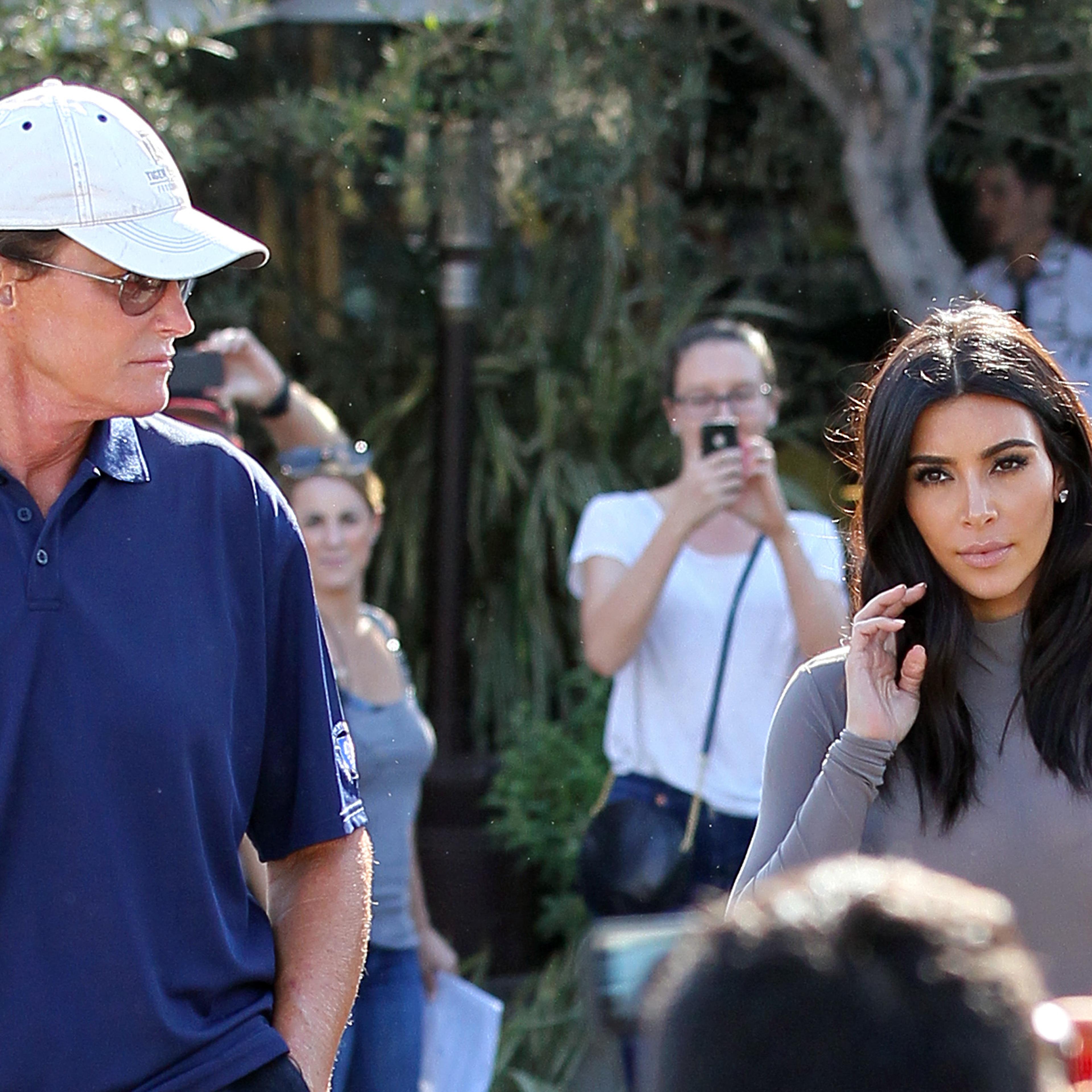 Bruce Jenner and Kim Kardashian are seen filming their reality show in Los Angeles on Oct. 20, 2014.
