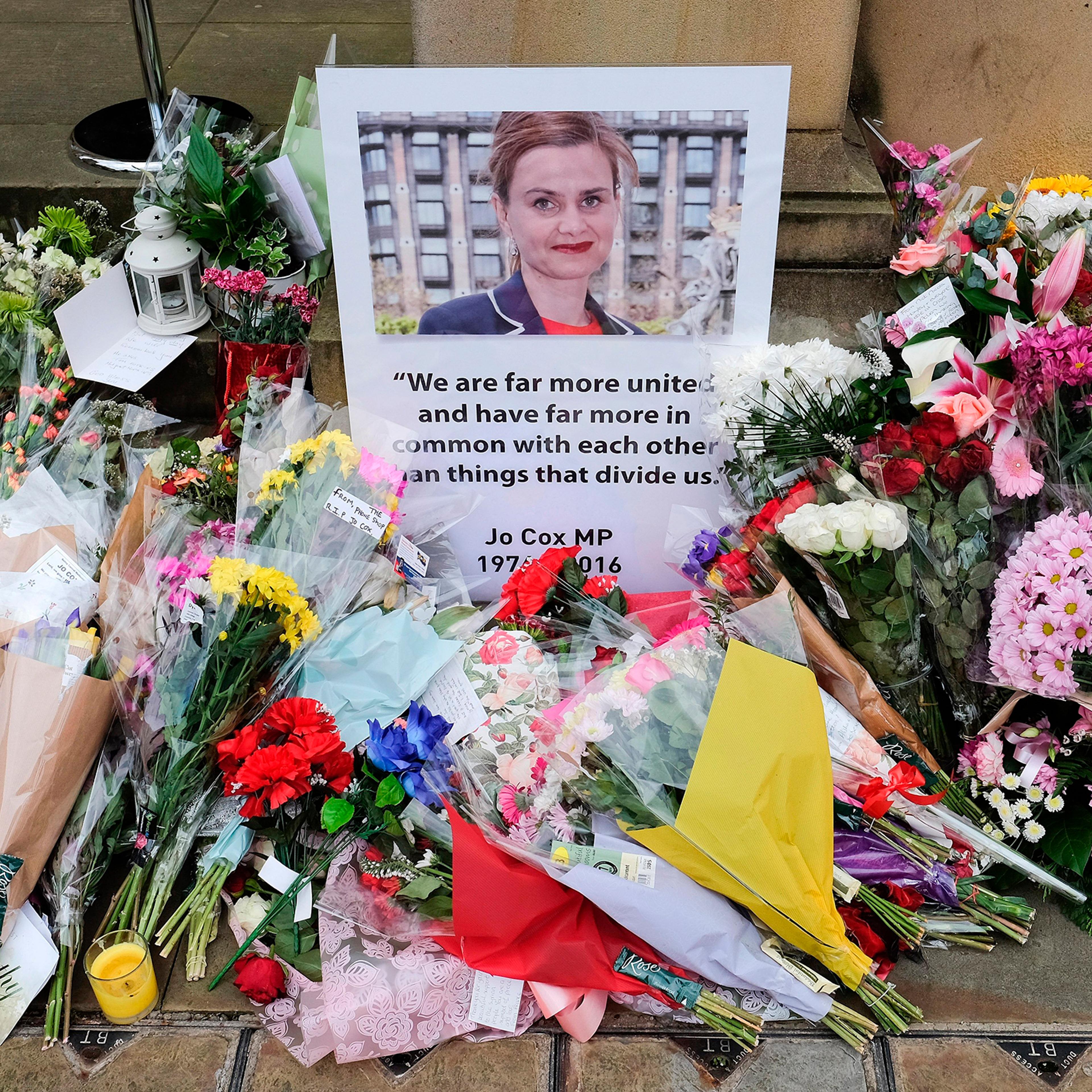 Floral tributes and messages are left outside Batley Town Hall ahead of a public event to celebrate the life and 42nd birthday of Labour MP Jo Cox in Batley, U.K., on June 22, 2016. Cox was shot and stabbed in the street on June 16 and later died.