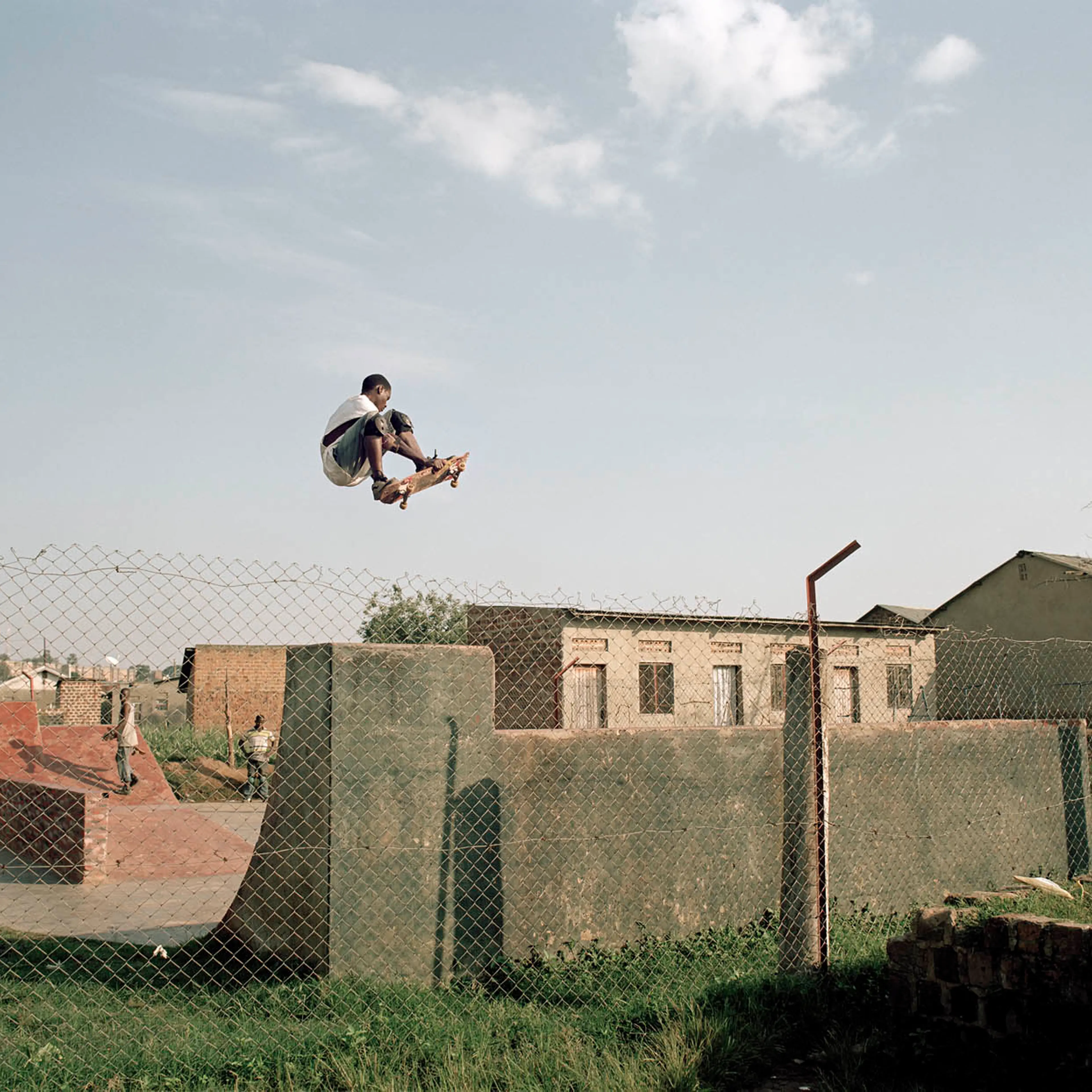 Douglas, 20, sets a great example for all the skaters and wants to take the Ugandan skateboarding scene to a higher level. Though he spends most of his time on the board, he finds time to clean the park and teach the younger children.