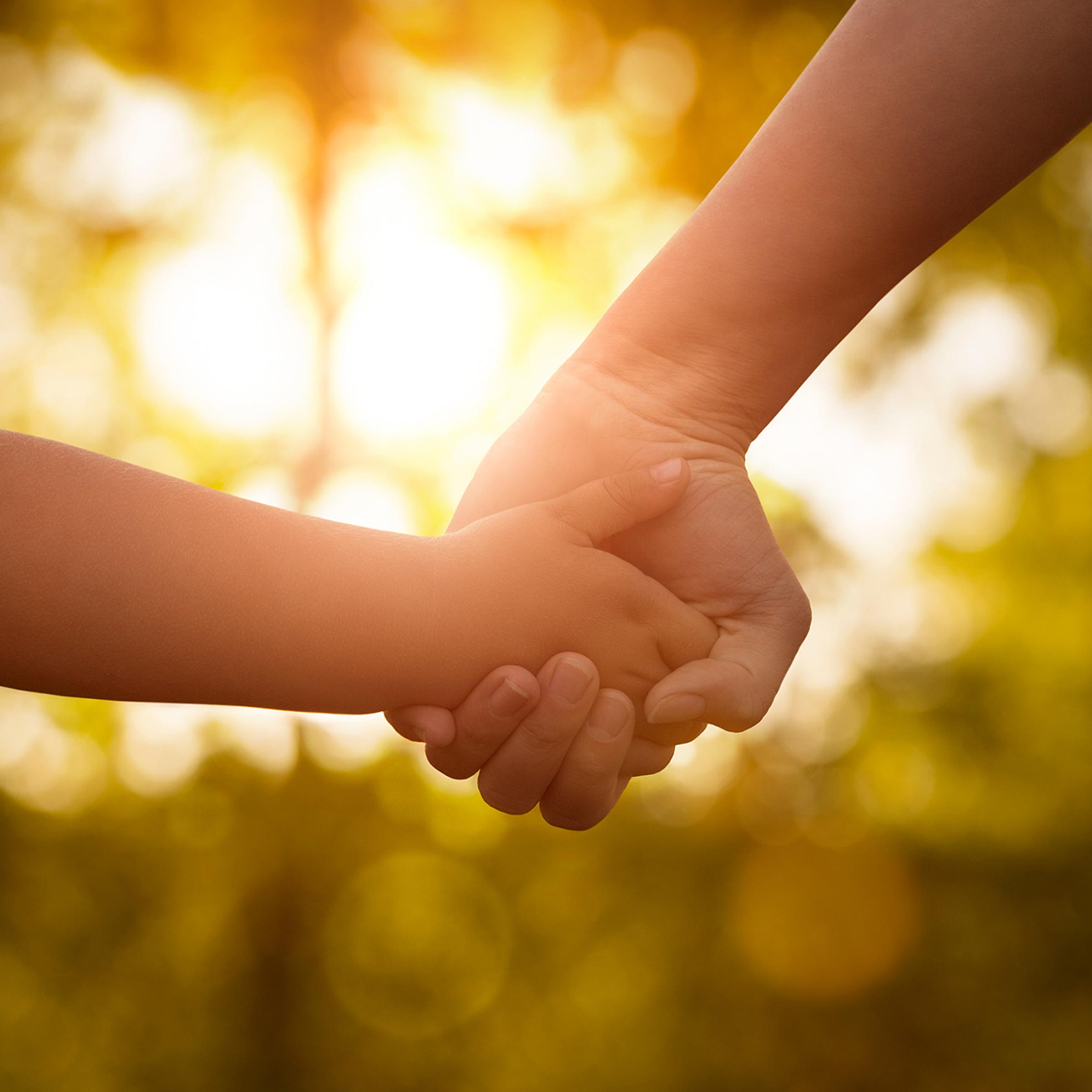 Mother's and a child hands