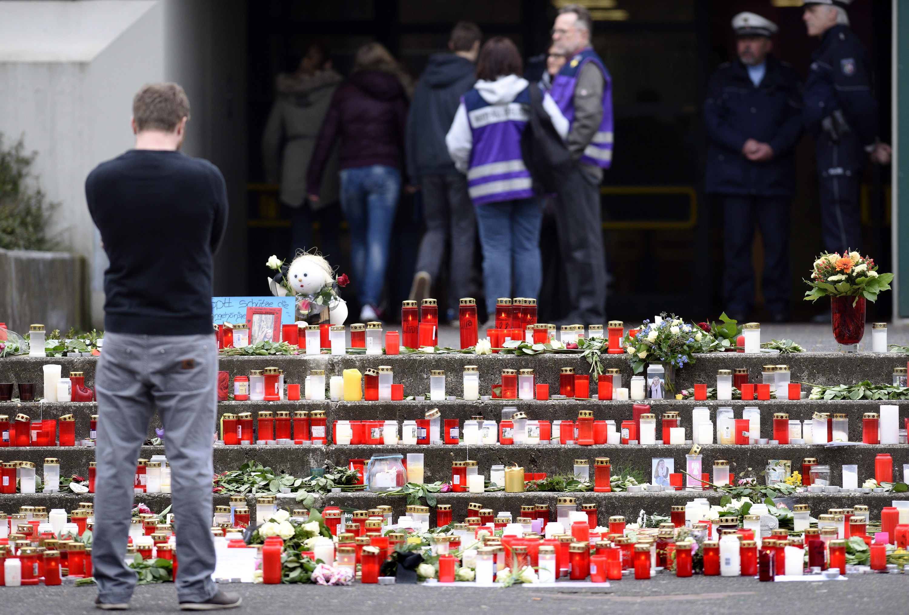 A memorial of flowers and candles can be seen in front of the Joseph-Koenig-Gymnasium secondary school in Haltern am See, western Germany on March 26, 2015.