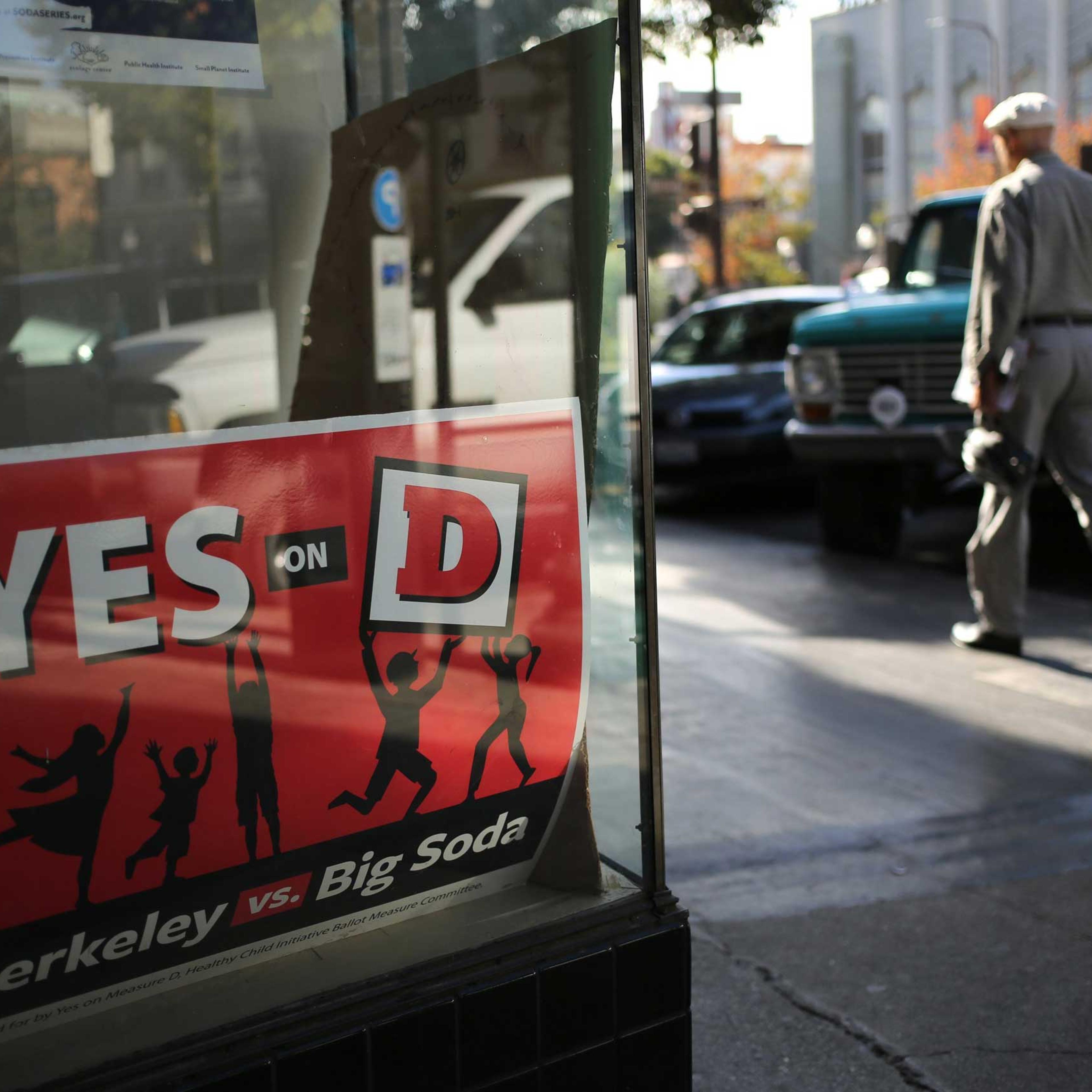 A sign for the "Yes on D" campaign in the window of the Measure D election headquarters in Berkeley, Calif., Nov. 3, 2014.