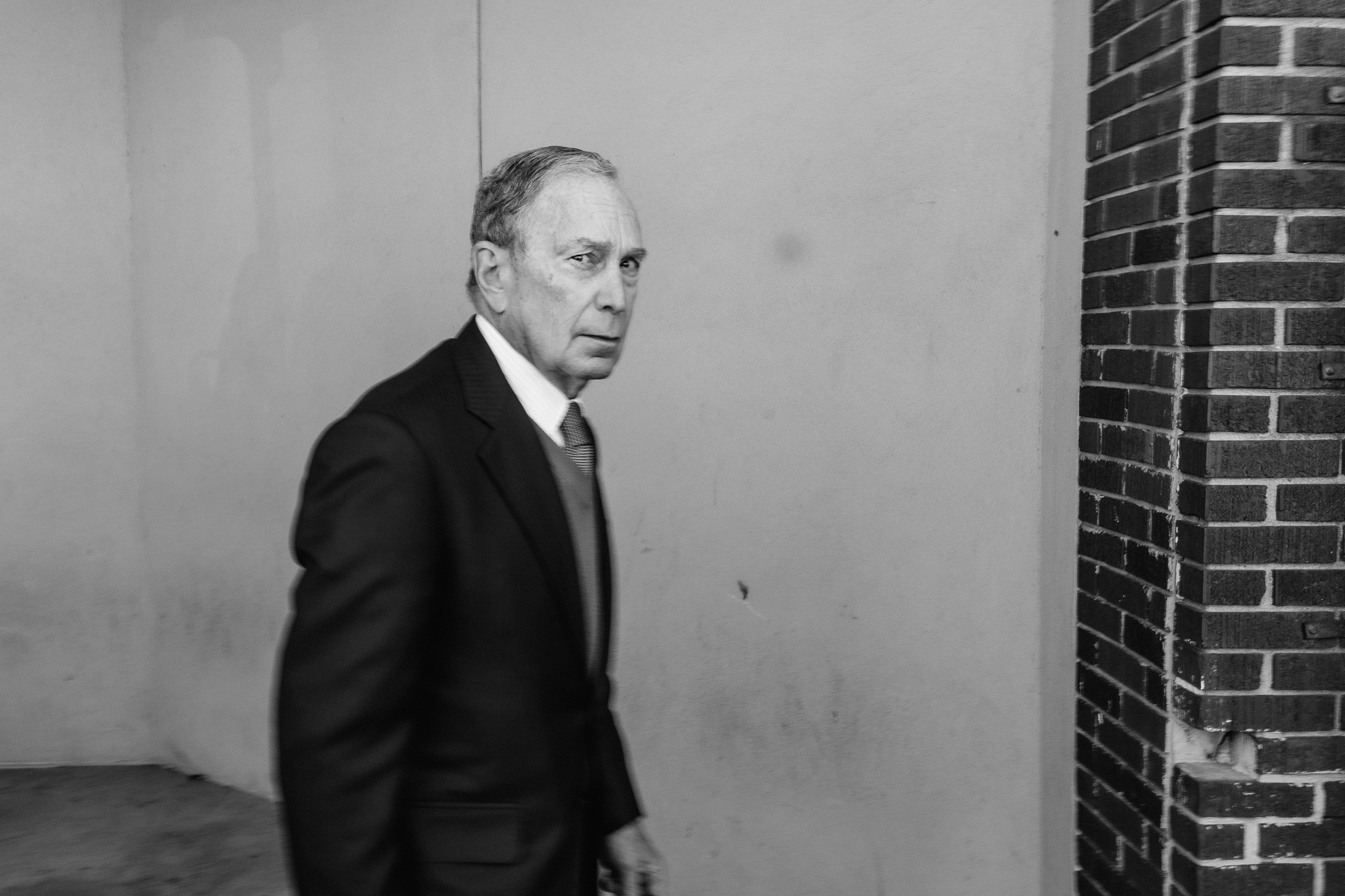 Memphis, Tennessee - February 28, 2020: Former New York City Mayor and 2020 presidential candidate Mike Bloomberg is seen walking with his staff after a political rally in Memphis, Tennessee ahead of Super Tuesday primary voting in key states around the 