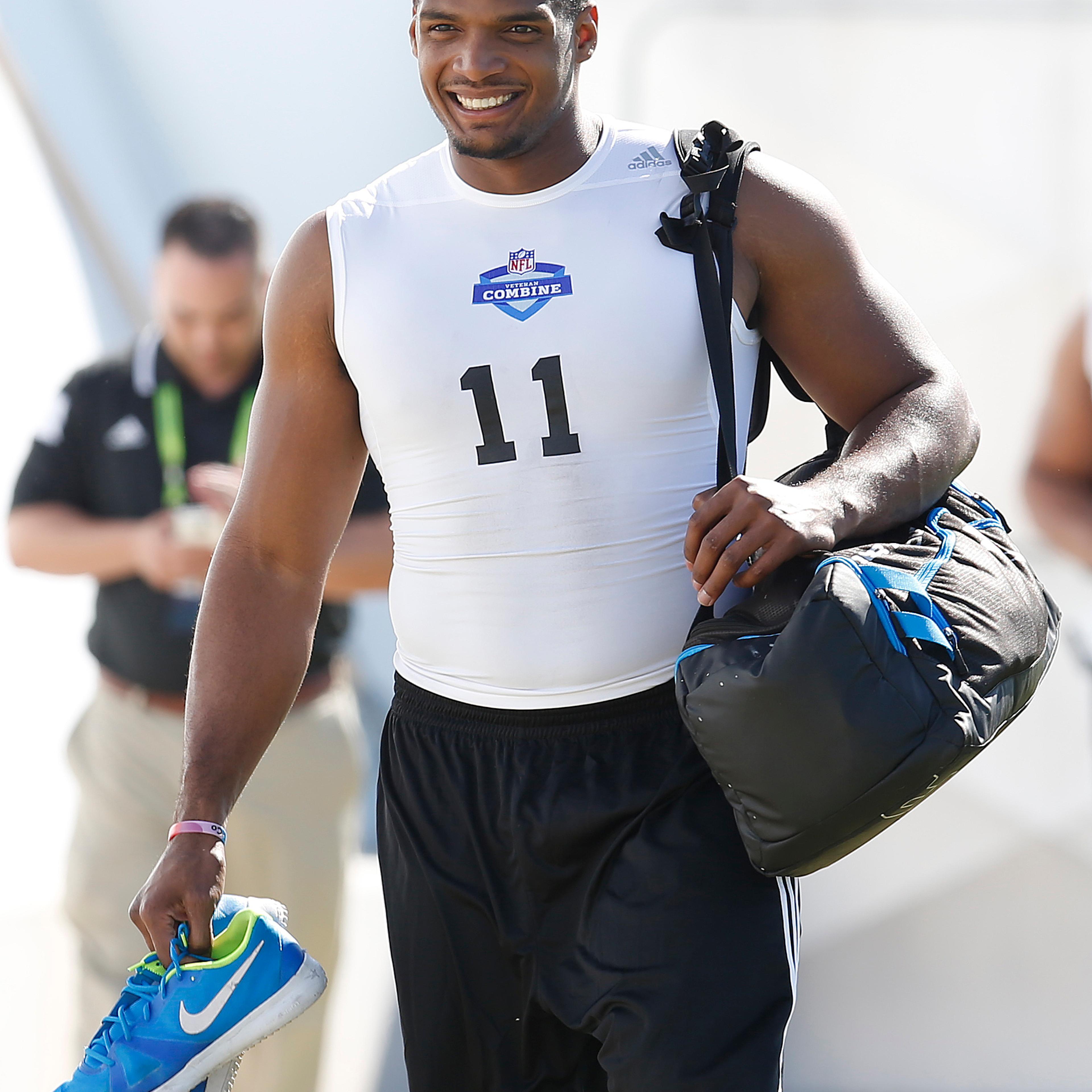 Defensive End Michael Sam, from Missouri, arrives before the NFL Super Regional Combine football workout on March 22, 2015 in Tempe, Ariz.