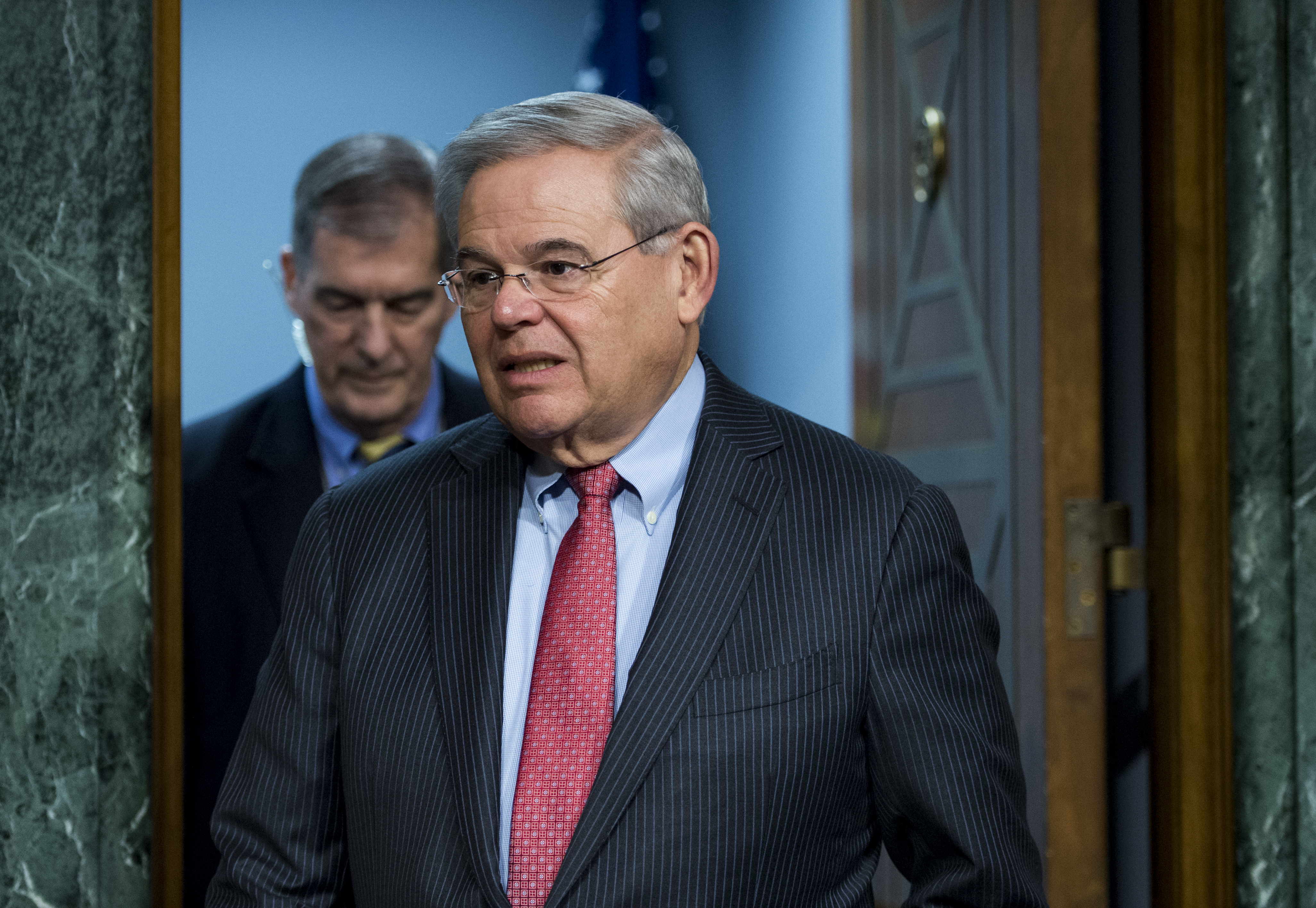 Sen. Bob Menendez, D-N.J., arrives for the Senate Banking, Housing and Urban Affairs Committee hearing on "The Semiannual Monetary Policy Report to the Congress" on Feb. 24, 2015.