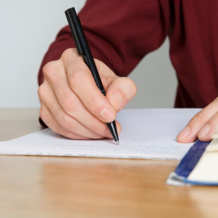 close-up-hand-taking-notes