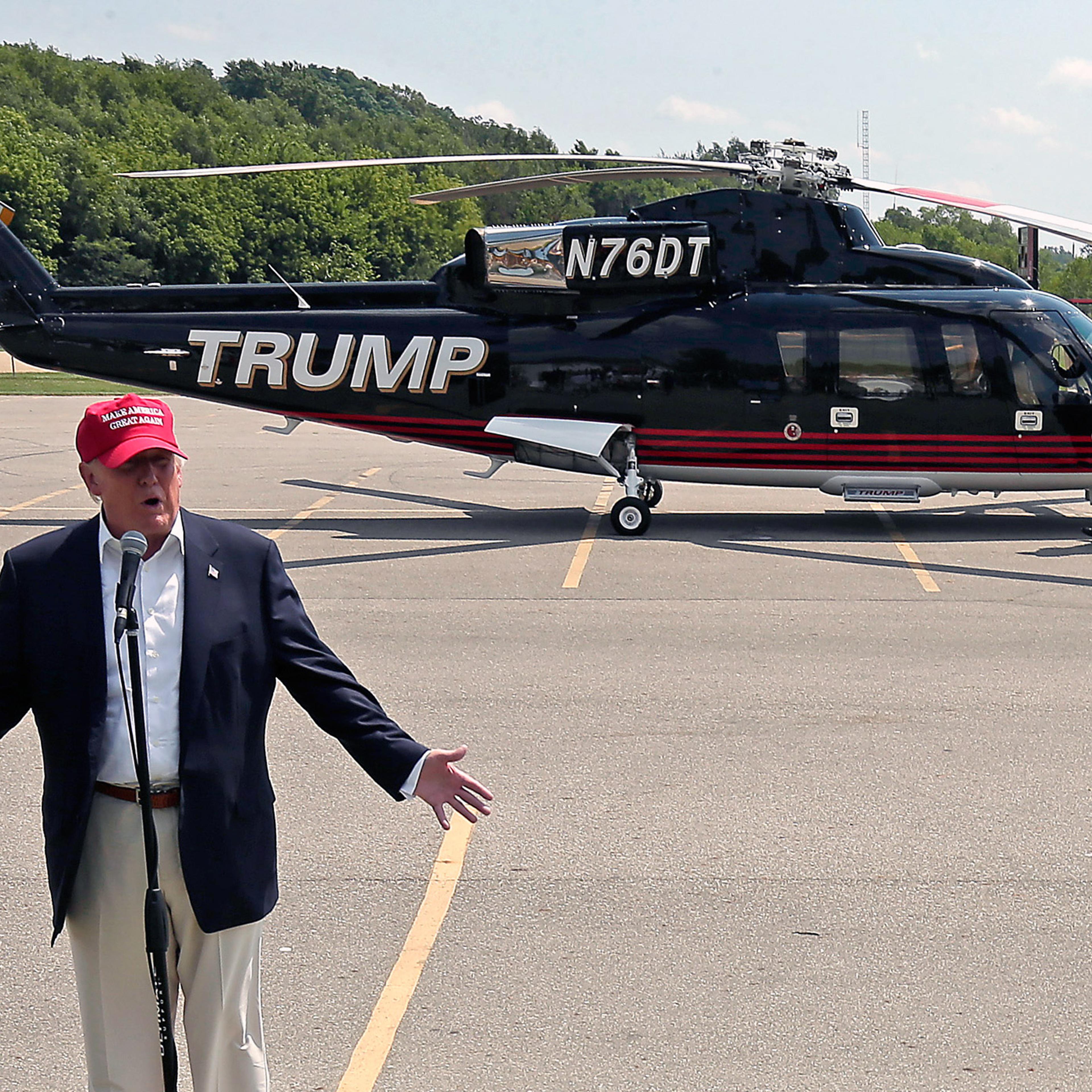 Republican presidential candidate Donald Trump speaks near his helicopter at the Iowa State Fair on Aug. 15, 2015, in Des Moines.