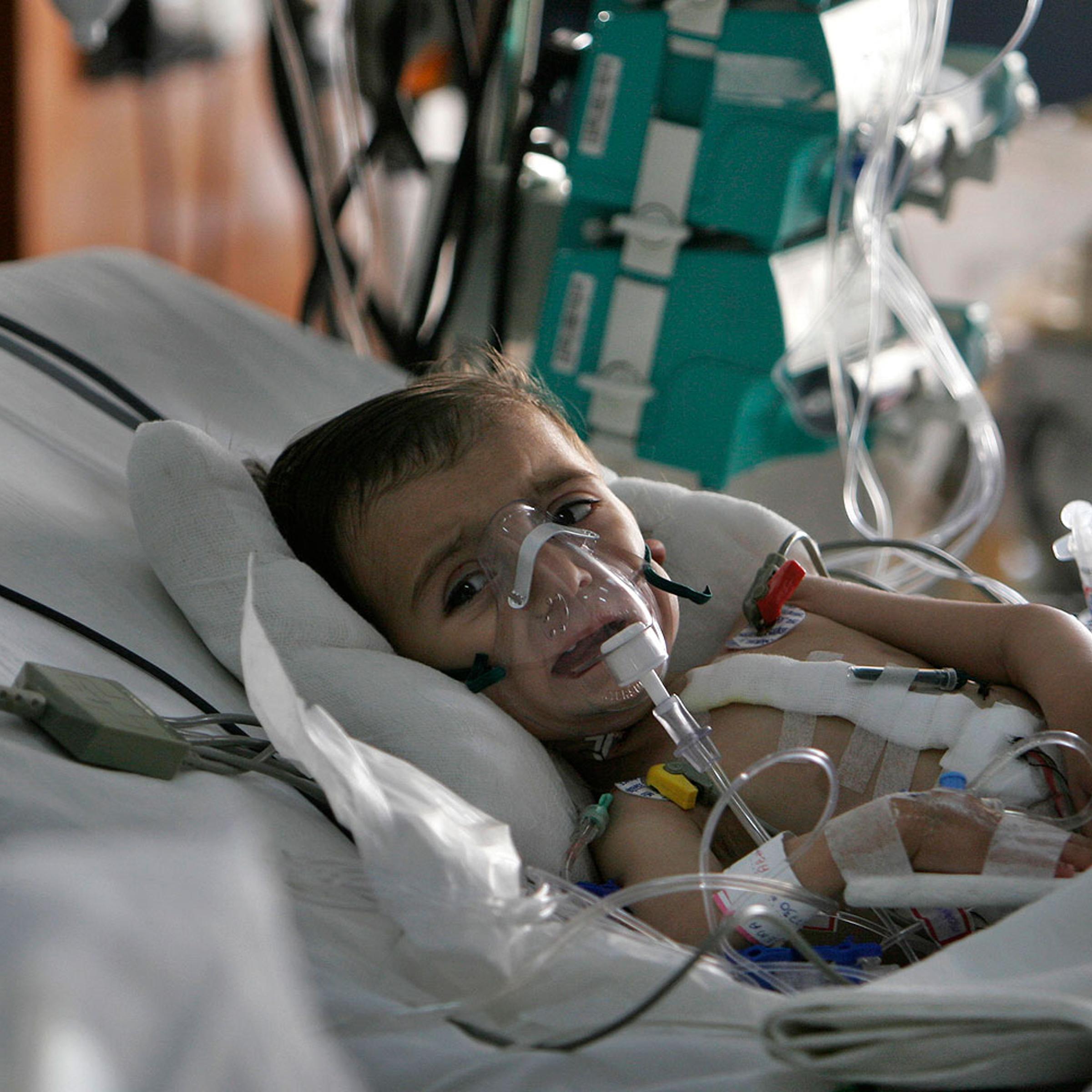 An Afghan child Leema, 17 months, recovers from heart surgery at Narayana Hrudayalaya hospital in Bangalore, India, in this file photo from 2008