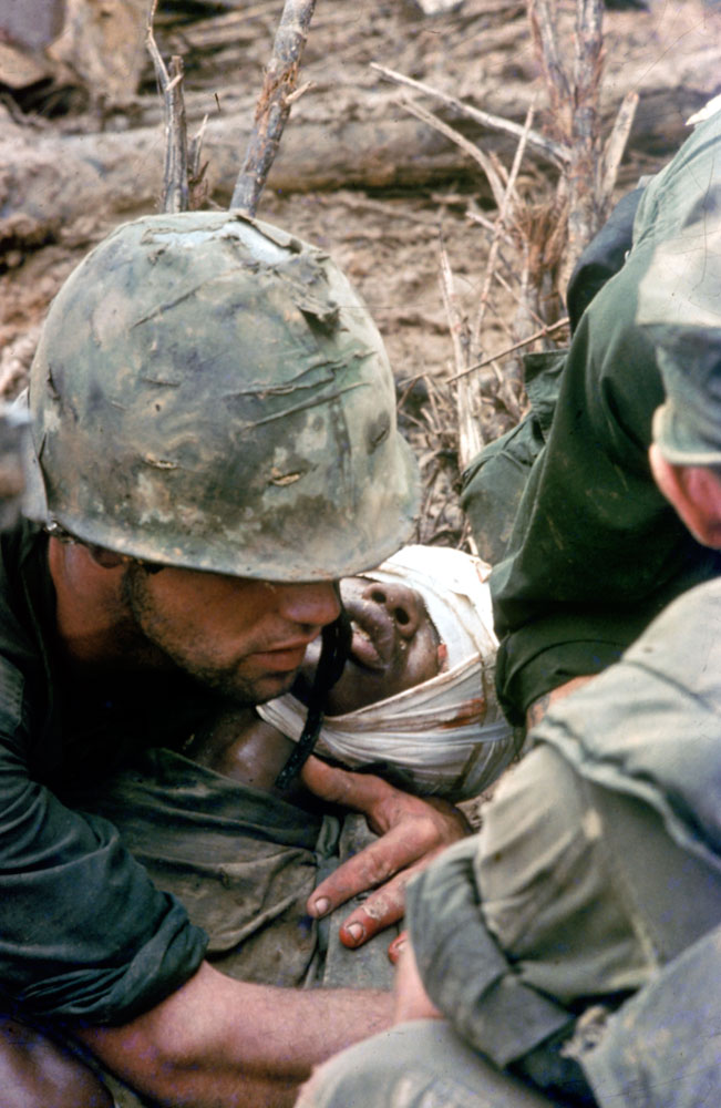 Vietnam War: Looking Again at Larry Burrows' Photo, 'Reaching Out'