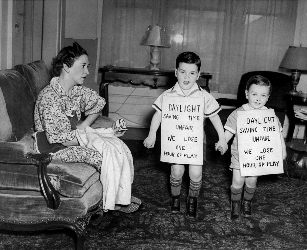 Children protest the daylight-savings time.