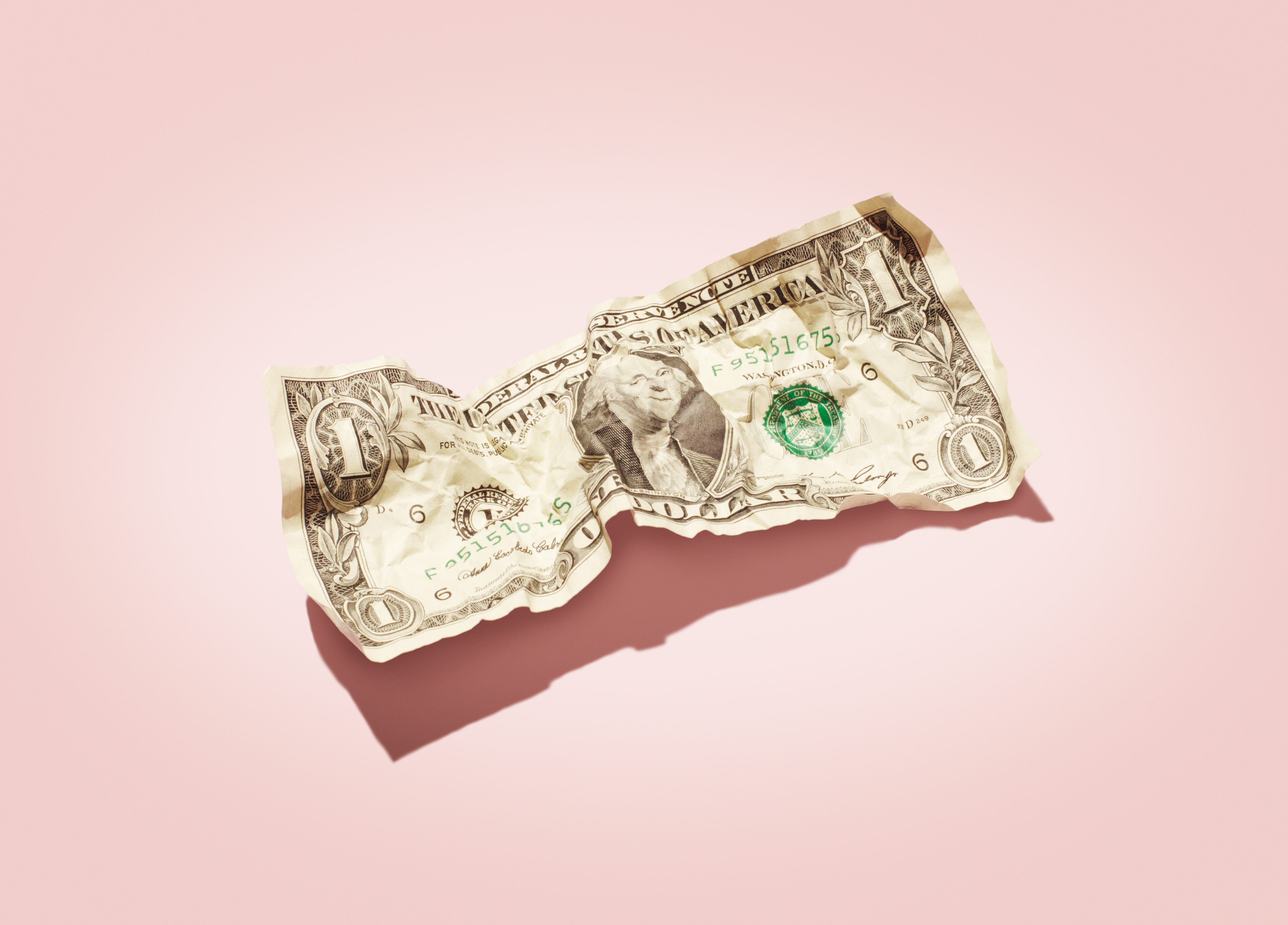 Crumpled 1 dollar note.