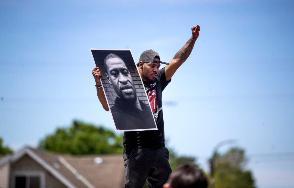 The third day of mourning and protesting and looting after the death of George Floyd in police custody