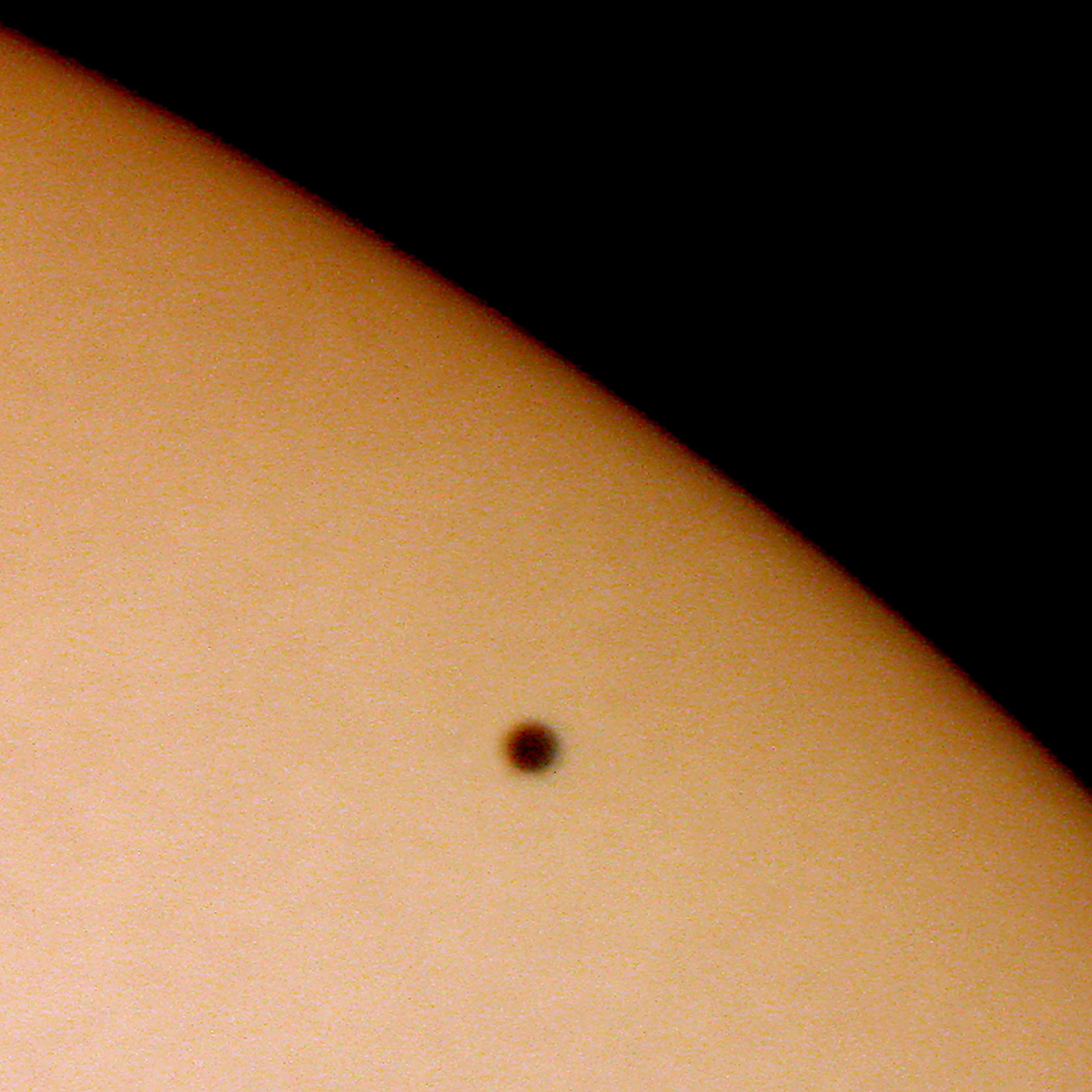 Planet Mercury transiting across the face of the Sun was taken on May 7, 2003.