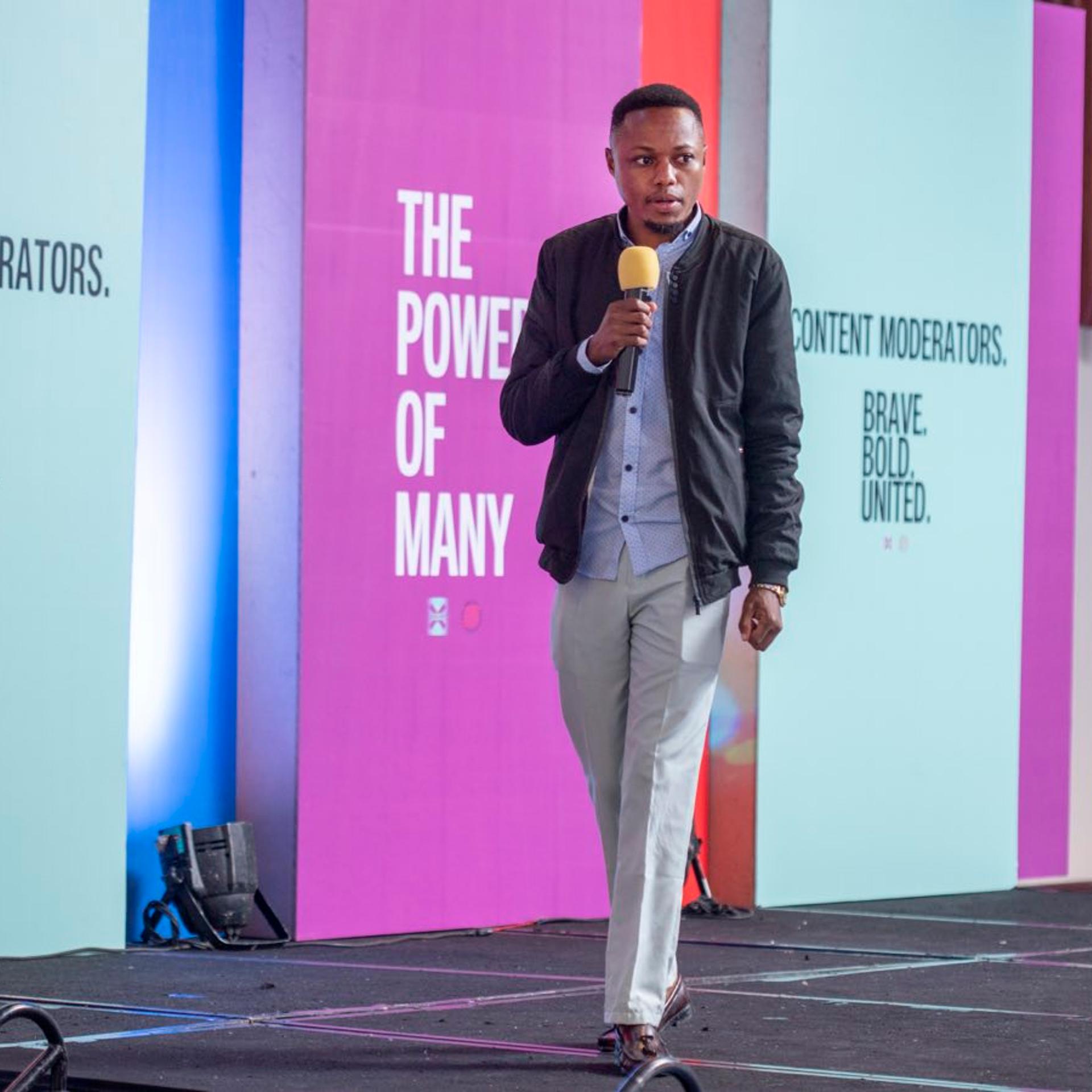 Daniel Motaung, a former Facebook content moderator who in 2019 was fired by the outsourcing company Sama during an attempt to register a union, speaks on stage to 150 workers in Nairobi on May 1, 2023, shortly before they voted to establish the Content Moderators Union.