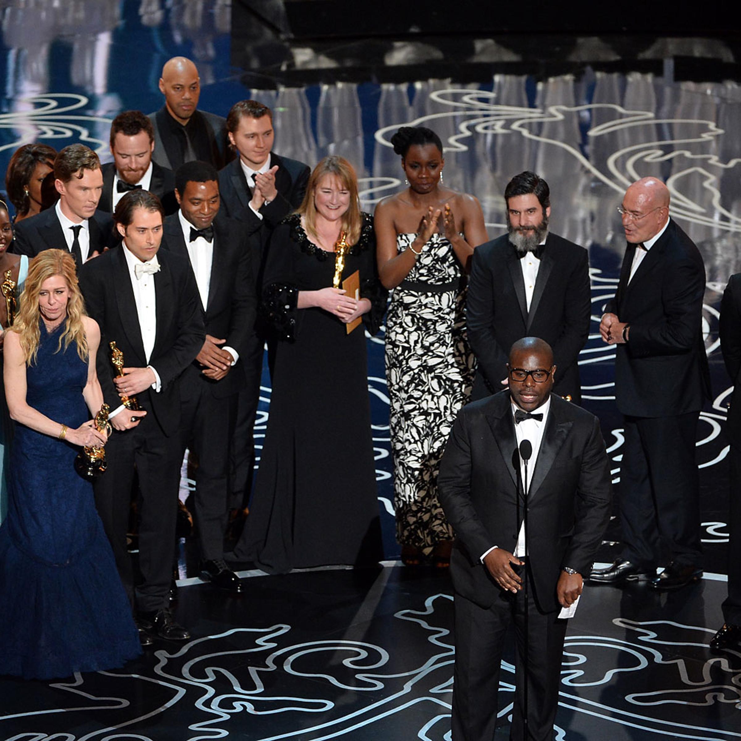 Director Steve McQueen (C) accepts the Best Picture award for '12 Years a Slave' onstage during the Oscars at the Dolby Theatre on March 2, 2014 in Hollywood, California.