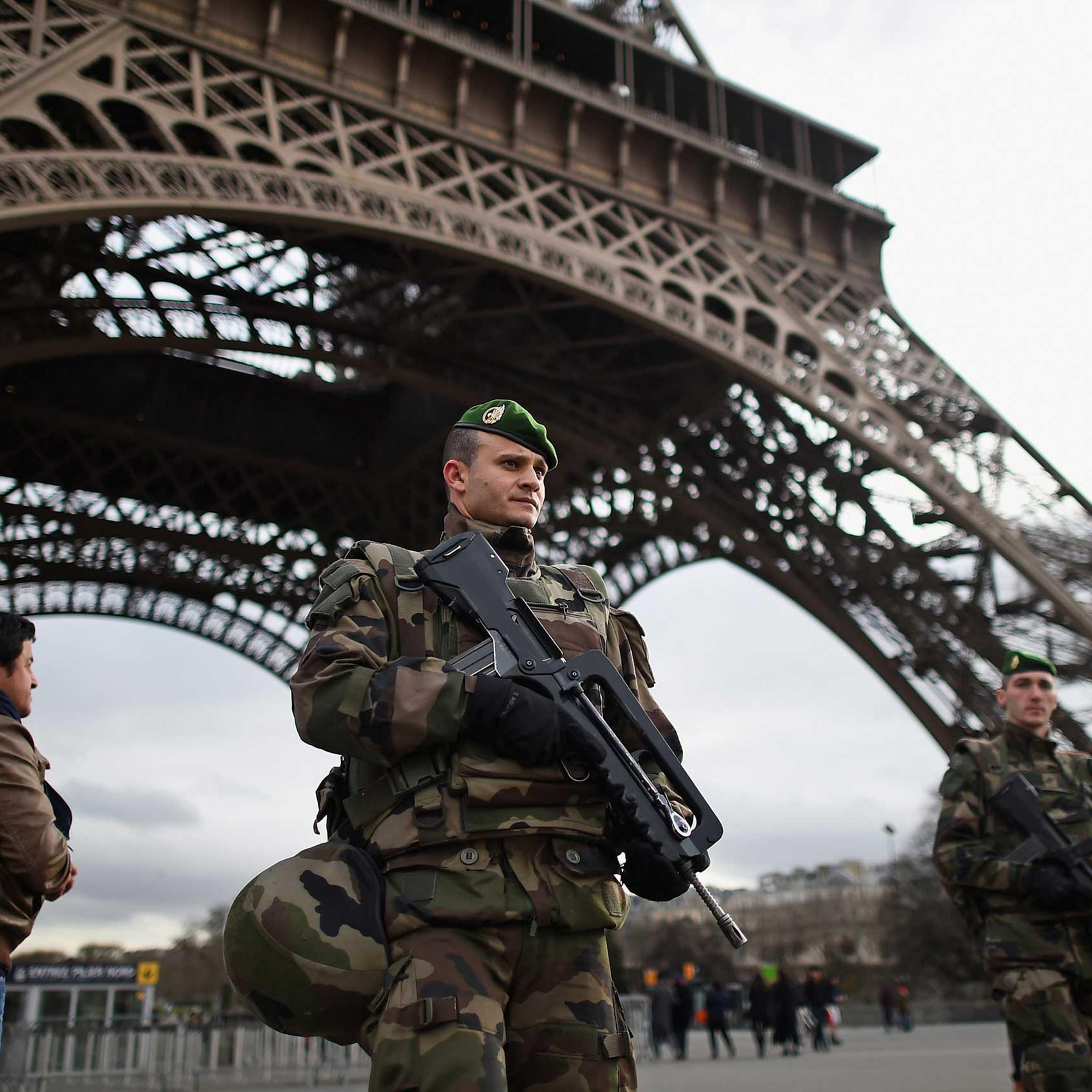 French troops patrol around the Eiffel Tower on Jan. 12, 2015 in Paris.
