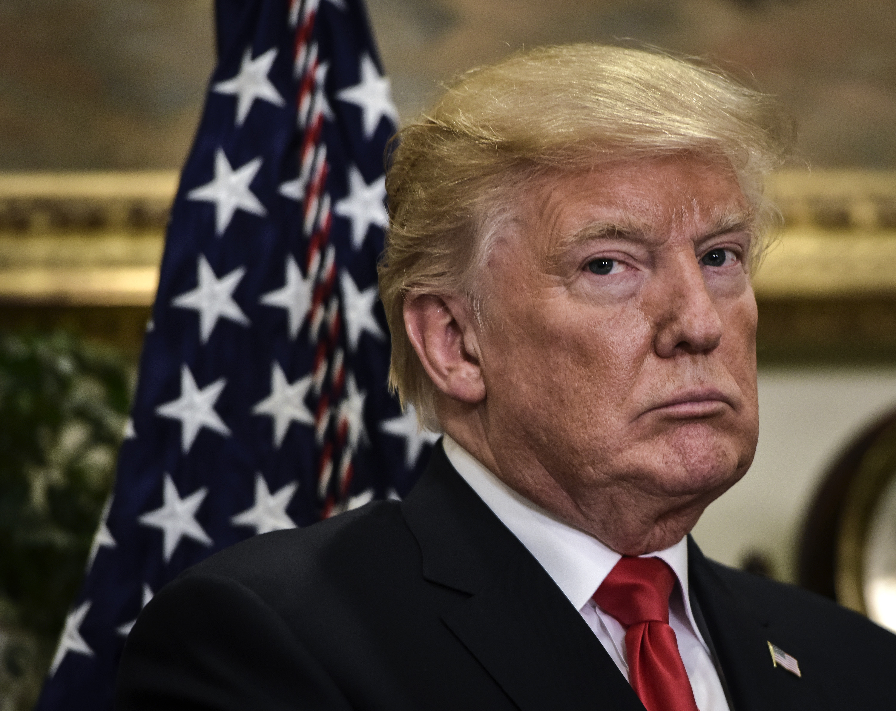 President Donald Trump presents a demonstration of a pharmaceutical glass packaging initiative, in Washington, DC.