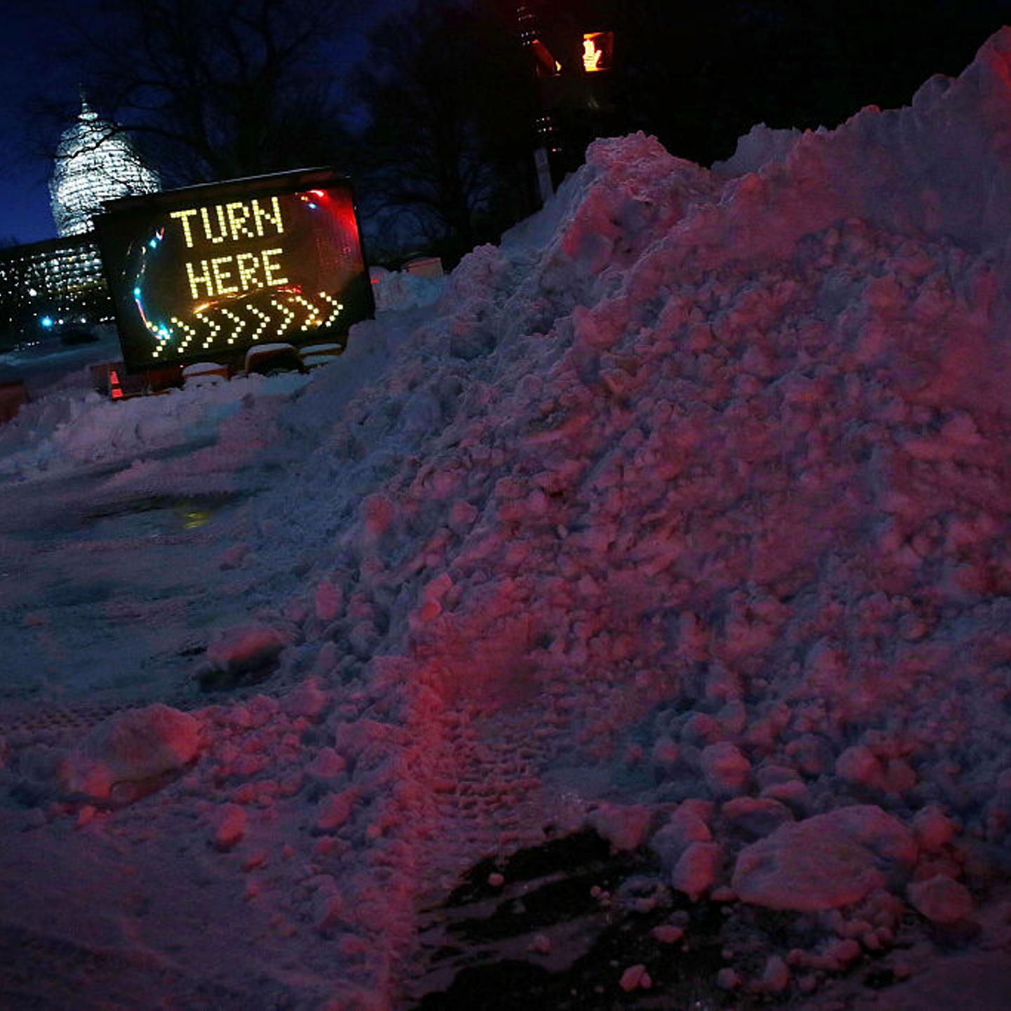 Piles of snow are seen in front of the U.S. Capitol on Jan. 24 in Washington, DC.