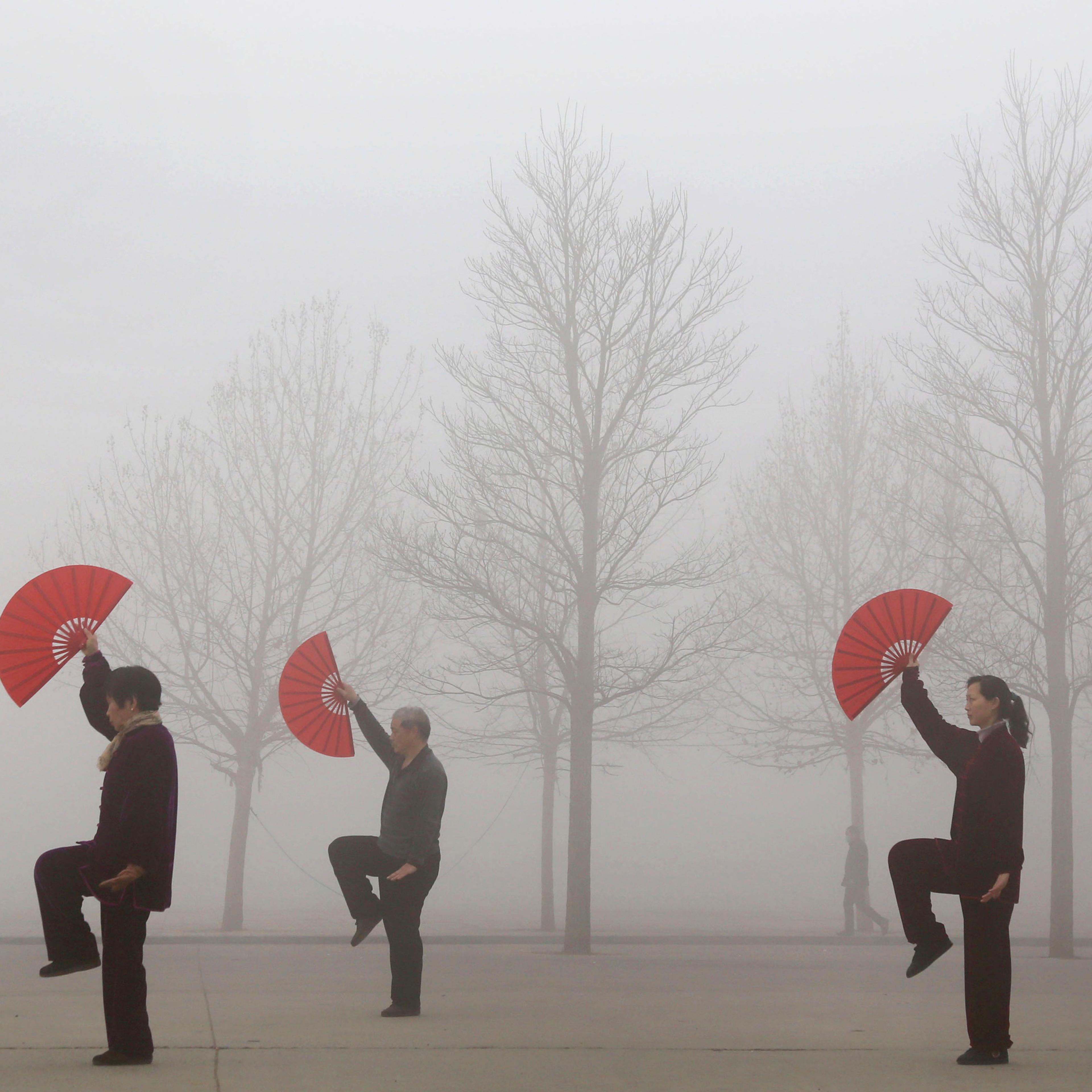 People do morning exercises on a polluted day in Jiaozuo