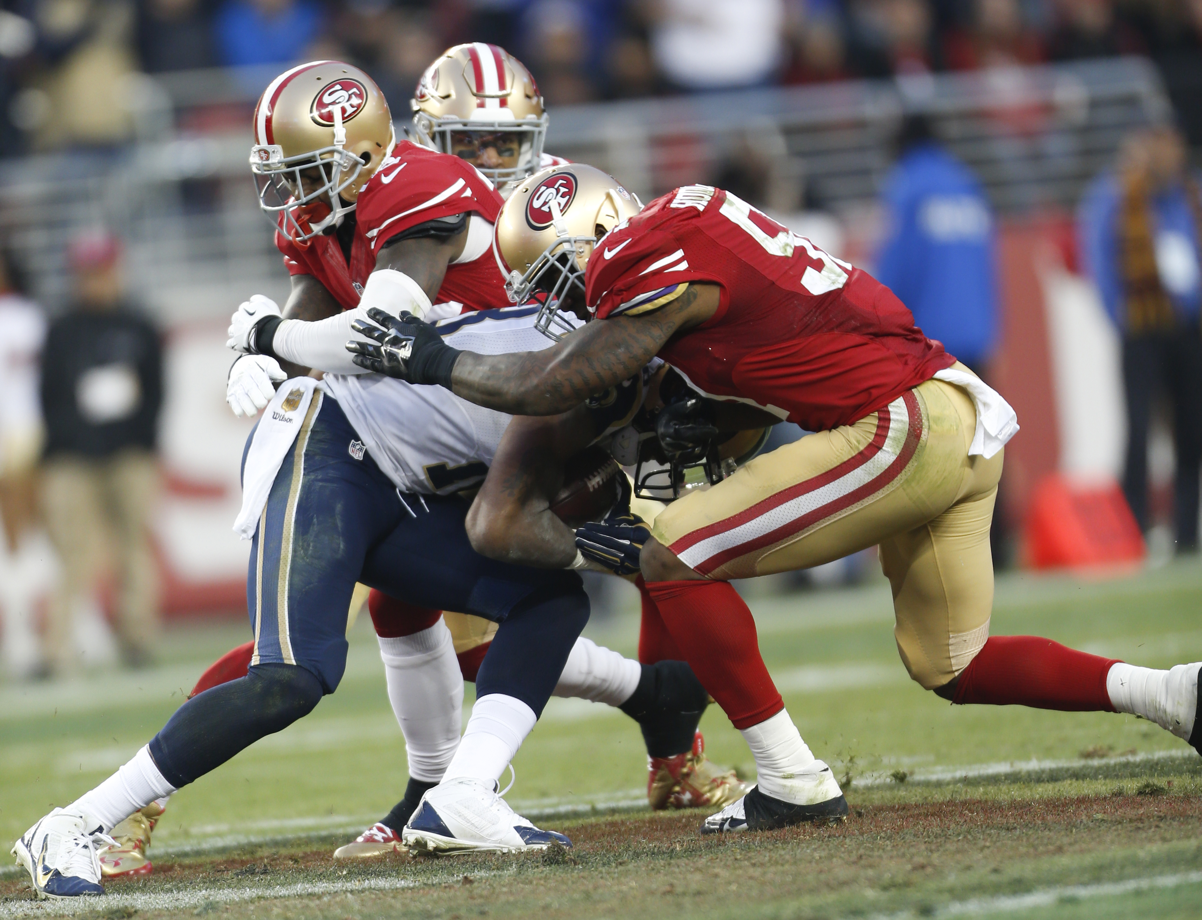Gerald Hodges, #51 of the San Francisco 49ers, makes a tackle during the game against the St. Louis Rams at Levi Stadium in Santa Clara, Calif., Jan. 3, 2016.