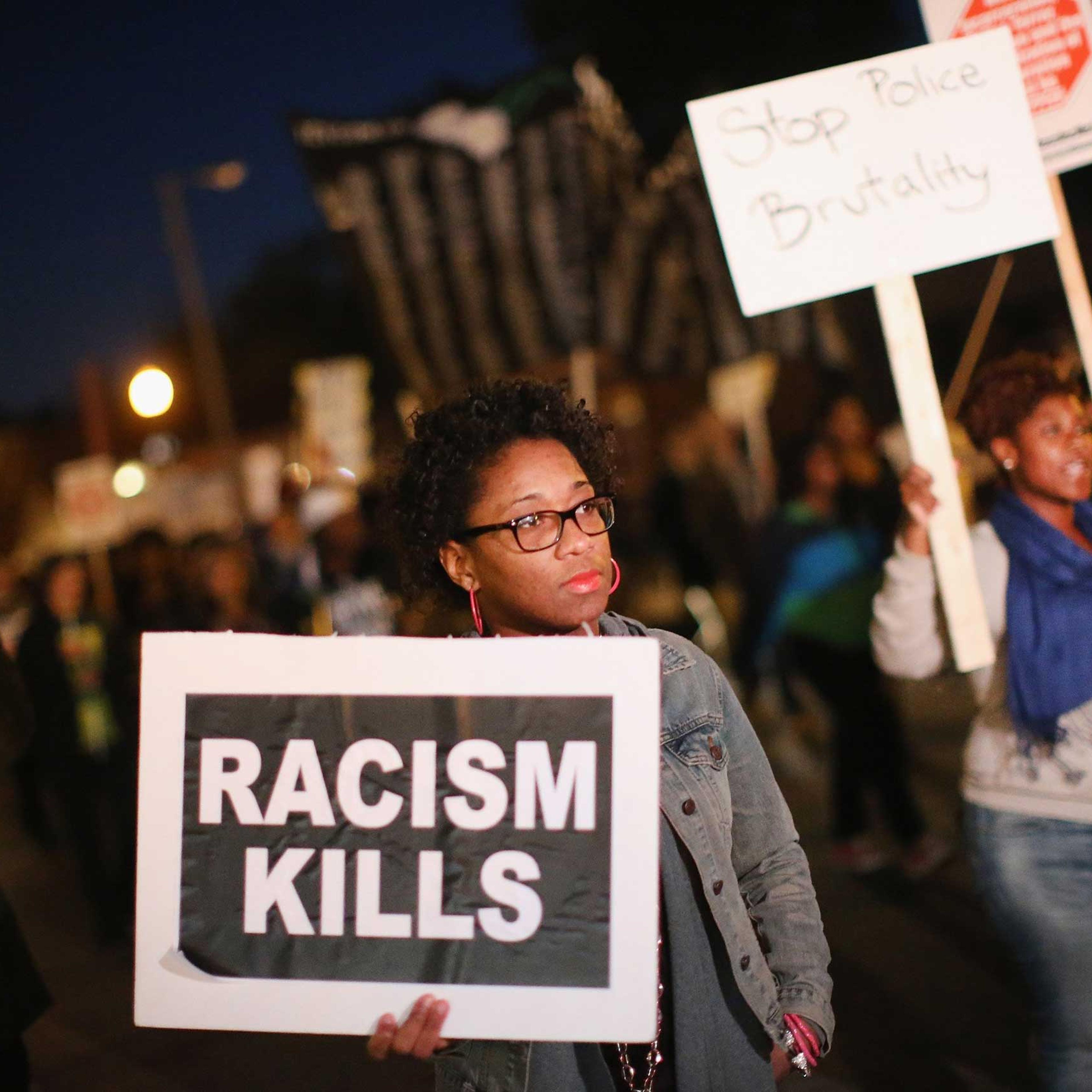 Activists March In Ferguson On Nat'l Day Of Action Against Police Brutality