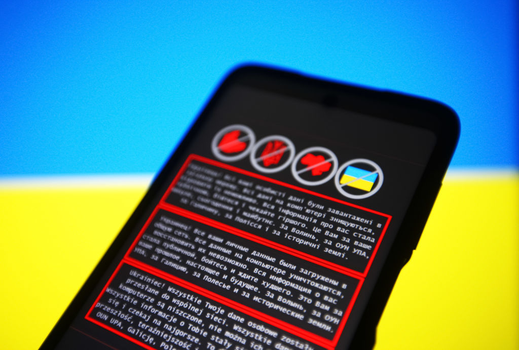 In this photo illustration, a warning message in Ukrainian,