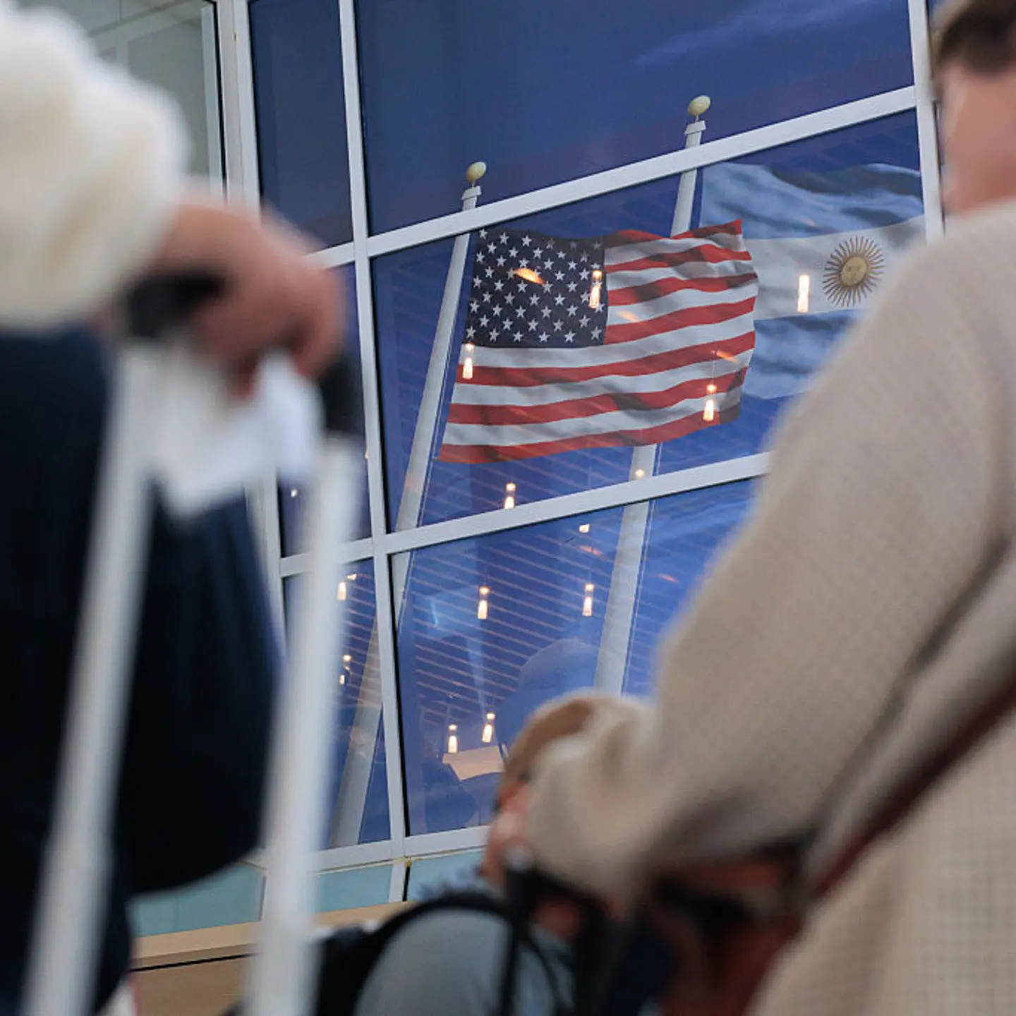 Travelers wait in line at a Transportation Security Administration (TSA) checkpoint at Dallas-Fort Worth International Airport (DFW) in Dallas, Texas, U.S., onOct. 20, 2025.