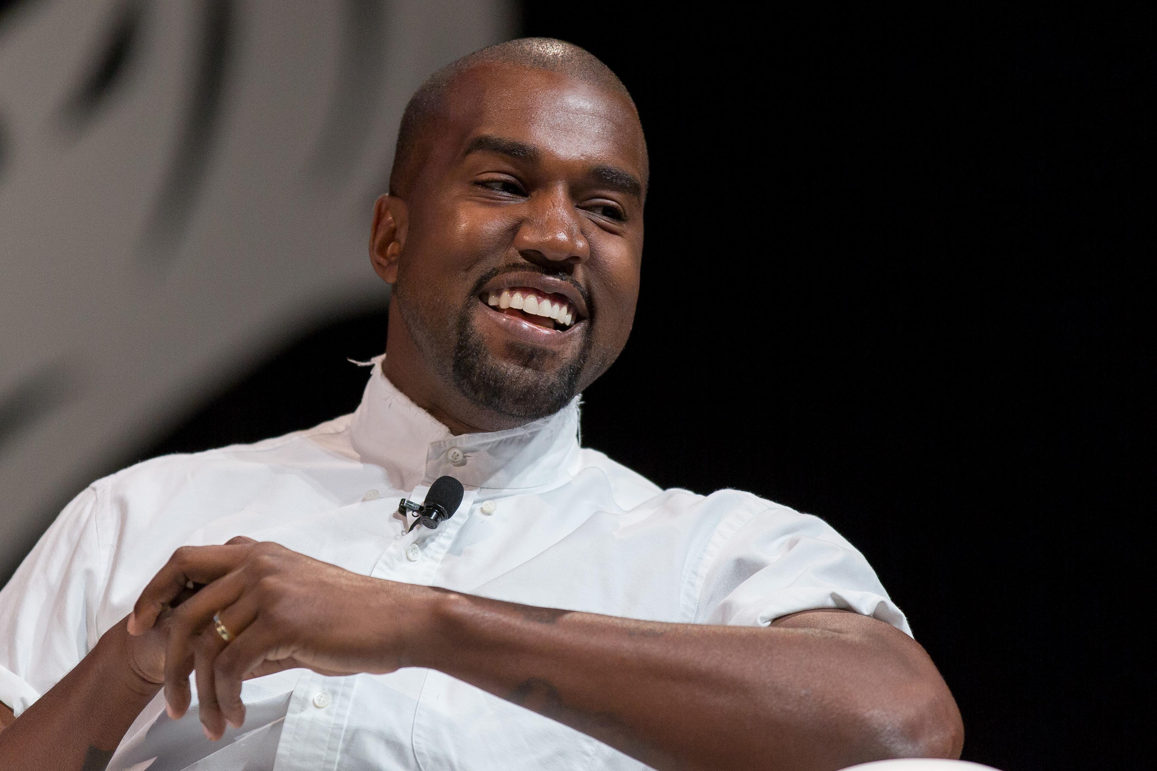 kanye west white dress shirt Ye, formerly known as Kanye West, arrived at Manhattan federal court dressed in white and confirmed his support for Diddy in his sex trafficking trial. However, he did not respond to questions about