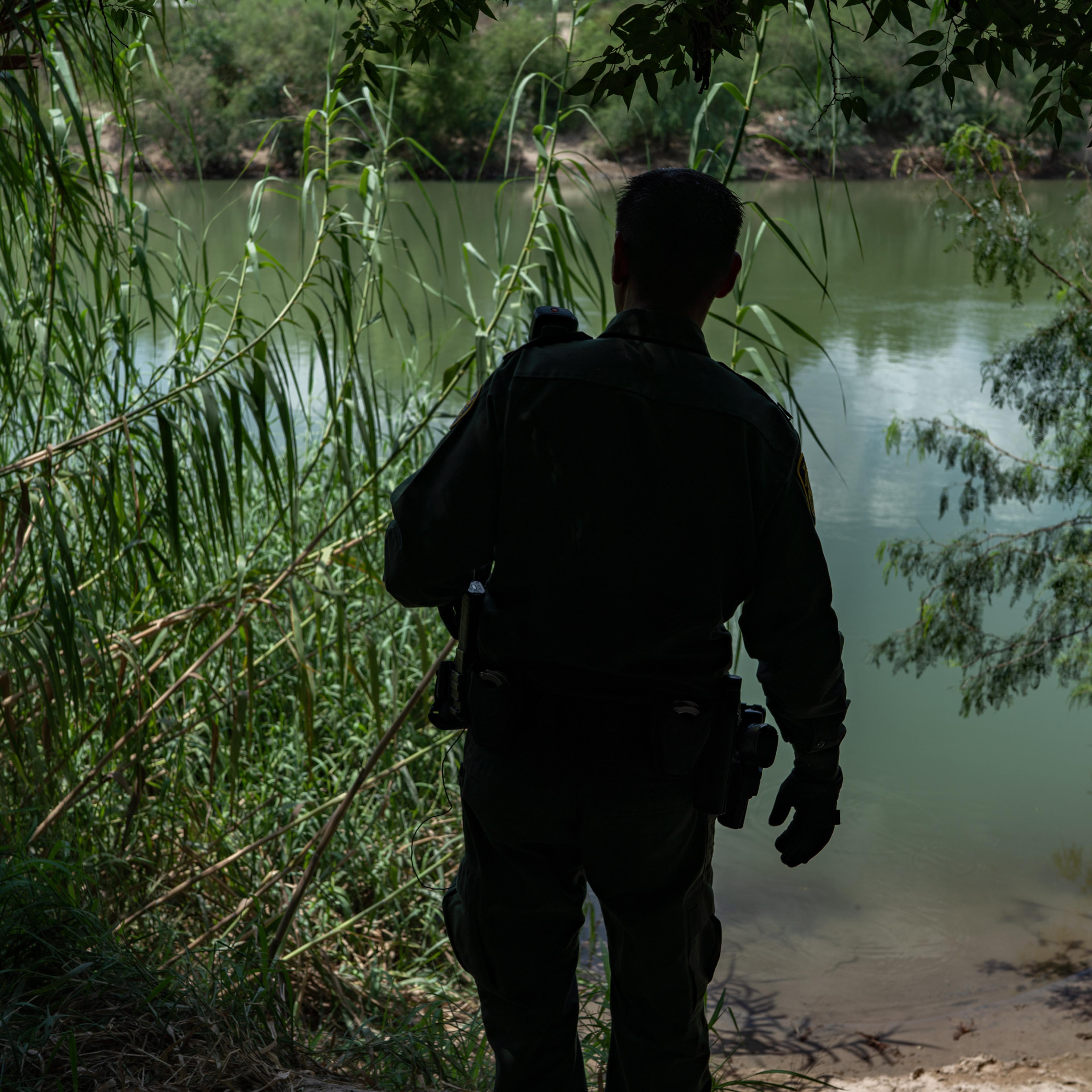 On U.S. soil a short boat ride from Mexico, Border Patrol agent Robert RodrÌguez, 38, checks a common landing area for people crossing the Rio Grande.