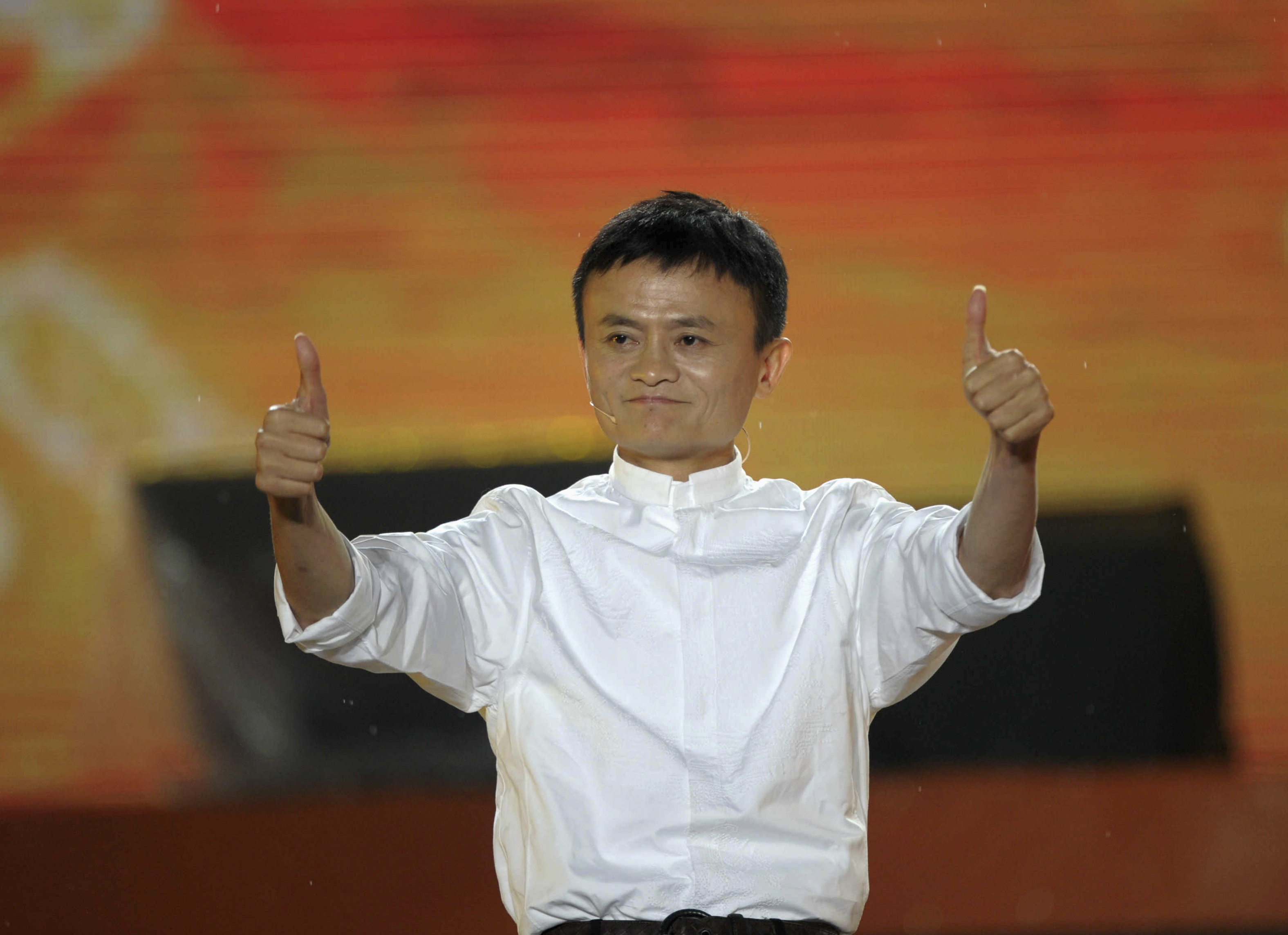 Alibaba founder Ma gestures during celebration of 10th anniversary of Taobao Marketplace, China's largest consumer-focused e-commerce website, in Hangzhou