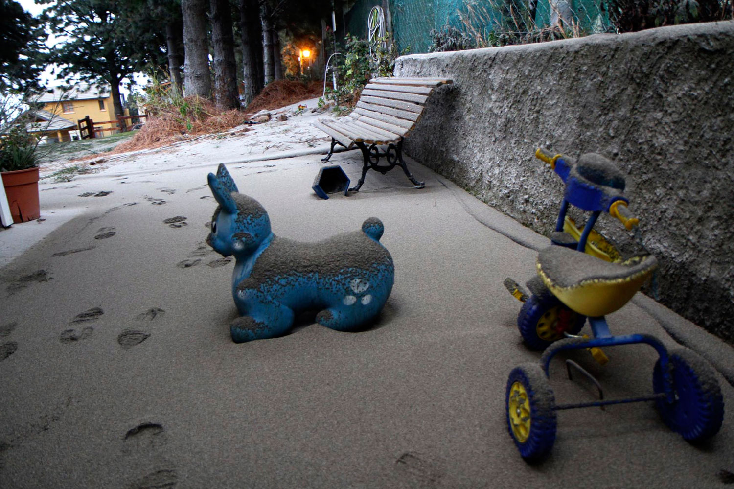 Toys covered with ash — from a volcano in the Puyehue-Cordon Caulle chain — over 100 miles away in the Argentine resort city of San Carlos de Bariloche June 5, 2011.
