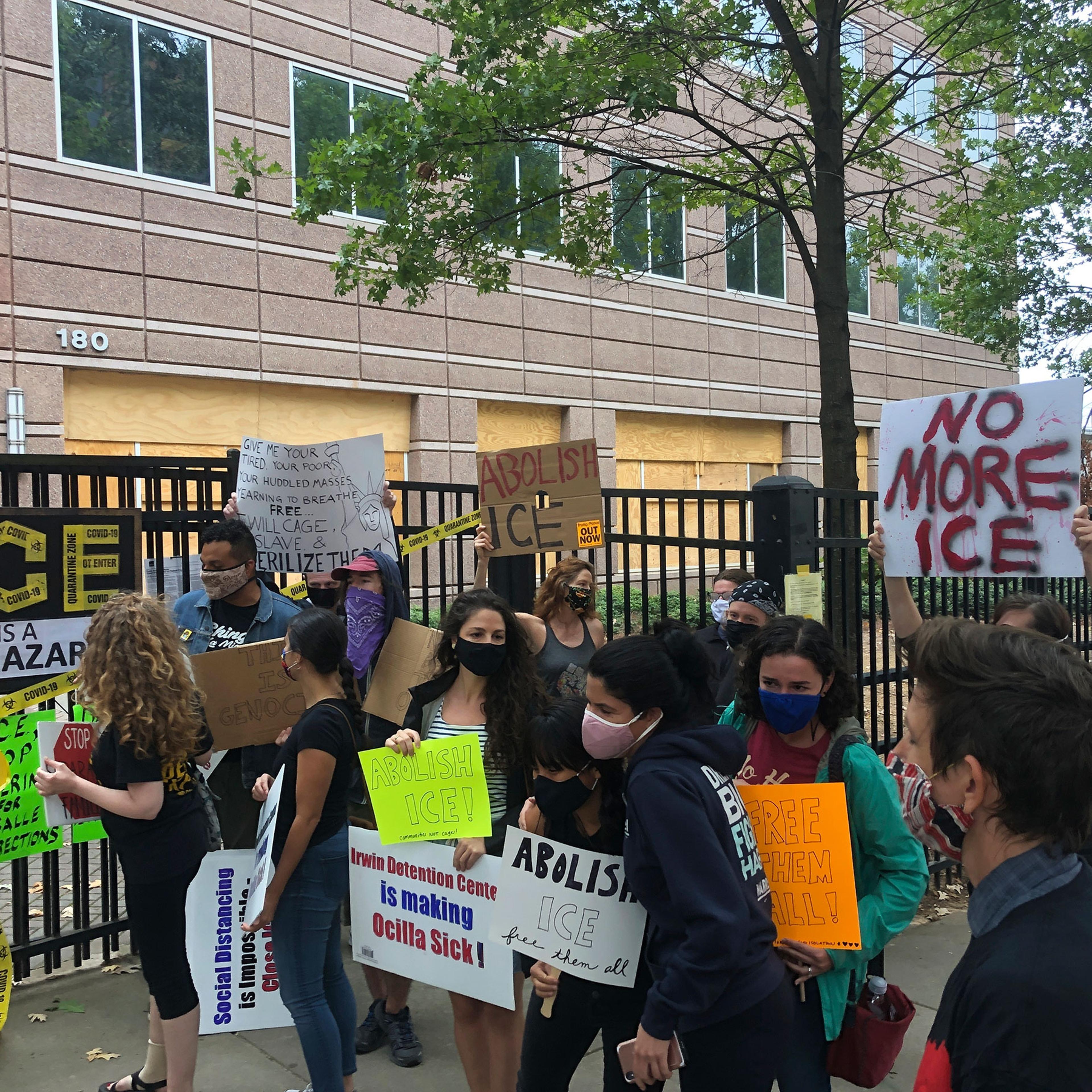 Protesters gather at a news conference in Atlanta, decrying conditions at Irwin County Detention Center in Ocilla, Ga., Sept. 15, 2020.