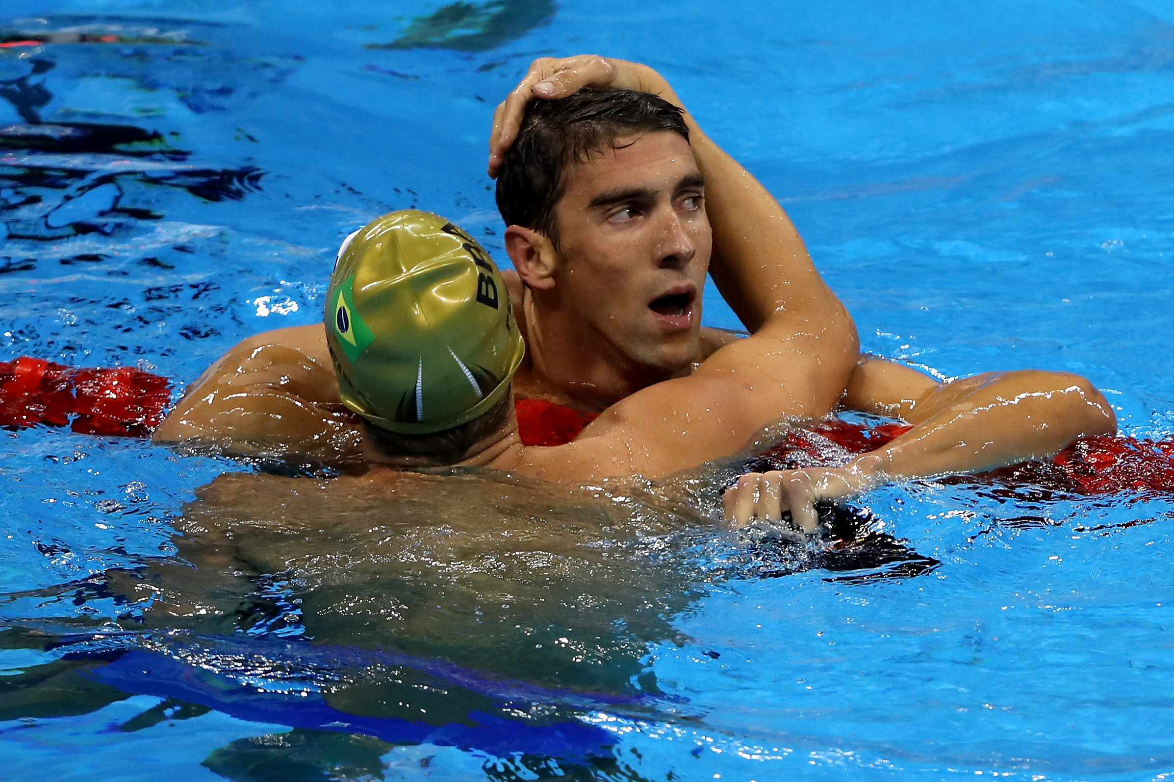 Michael Phelps of the United States embraces Thiago Pereira of Brazil after winning the Men's 200m Individual Medley Final on Day 6 of the Rio 2016 Olympic Games at the Olympic Aquatics Stadium on Aug. 11, 2016.