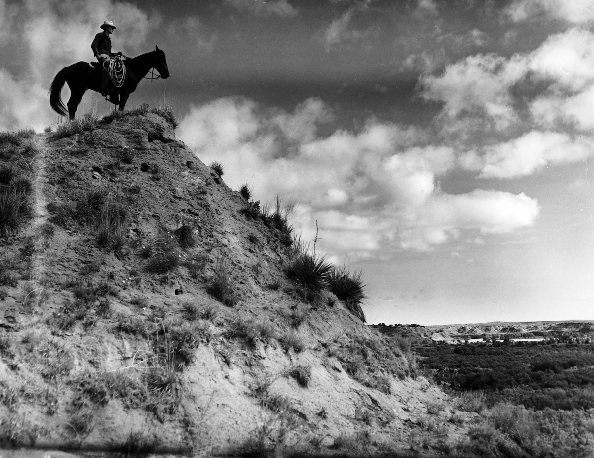 Cowboy on horseback at the Matador Ranch