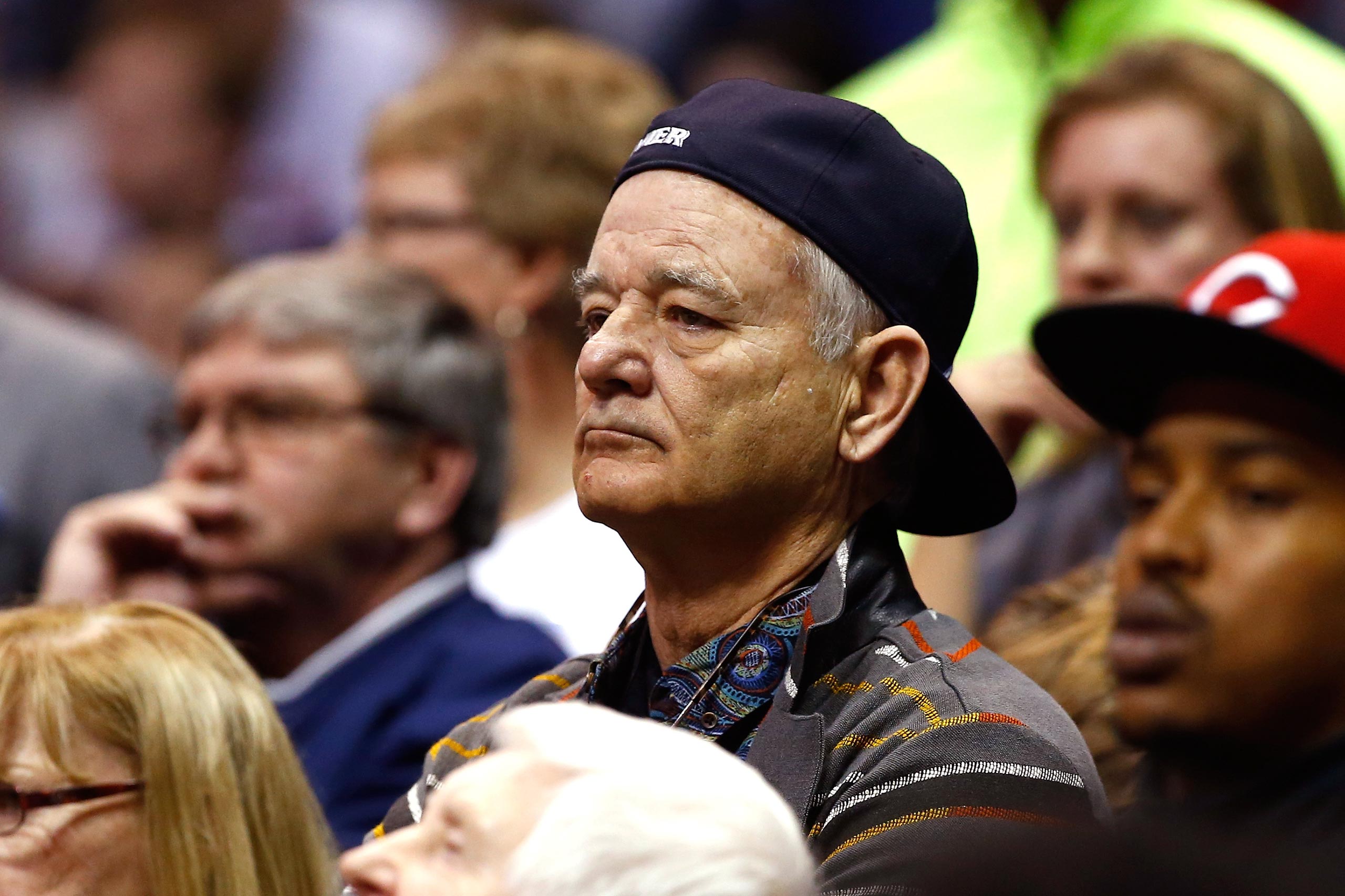 Actor Bill Murray attends the game between the Xavier Musketeers and the Wisconsin Badgers during the second round of the 2016 NCAA Men's Basketball Tournament at Scottrade Center in St. Louis, Mo., March 20, 2016. Murray's son Luke Murray is an assistan