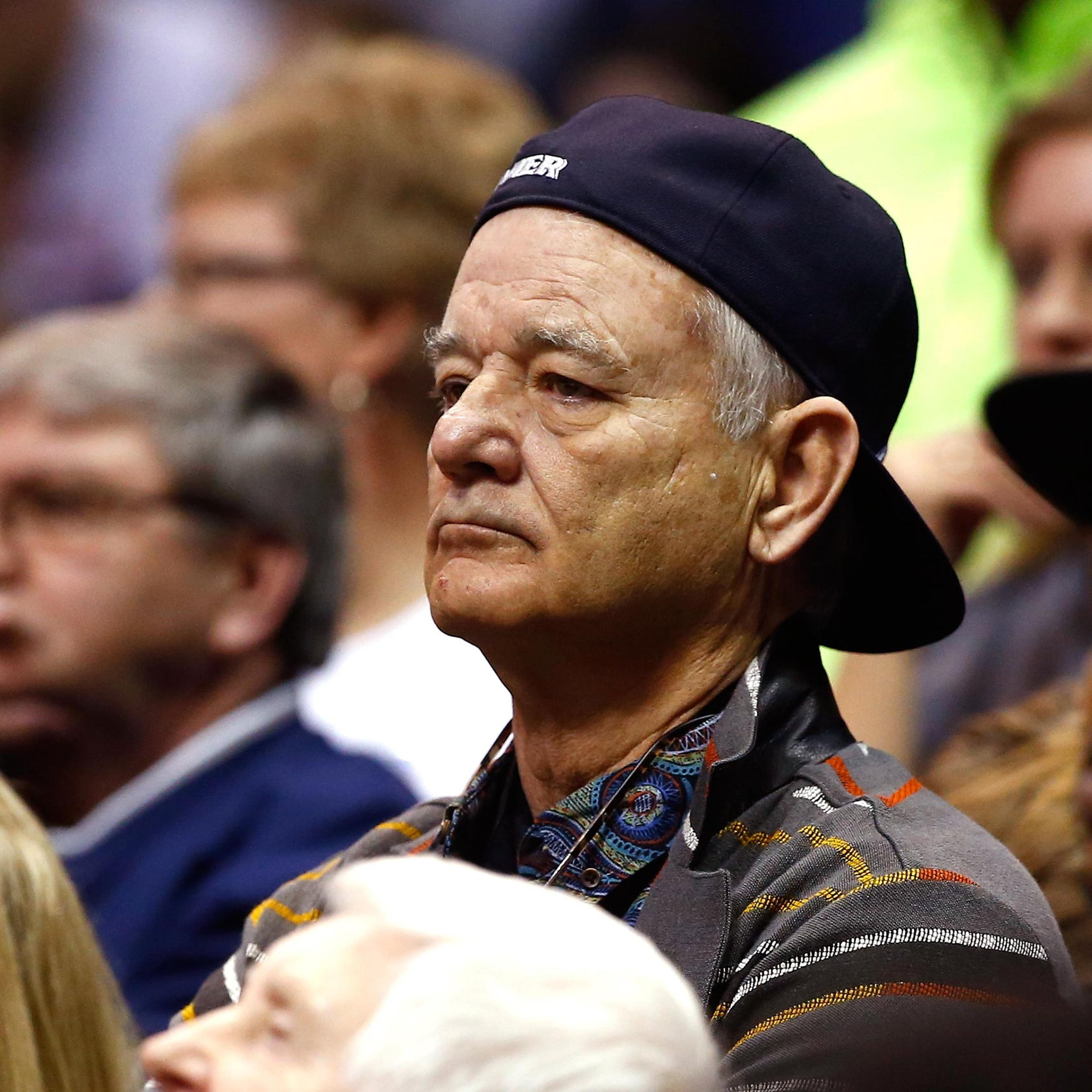 Actor Bill Murray attends the game between the Xavier Musketeers and the Wisconsin Badgers during the second round of the 2016 NCAA Men's Basketball Tournament at Scottrade Center in St. Louis, Mo., March 20, 2016. Murray's son Luke Murray is an assistan