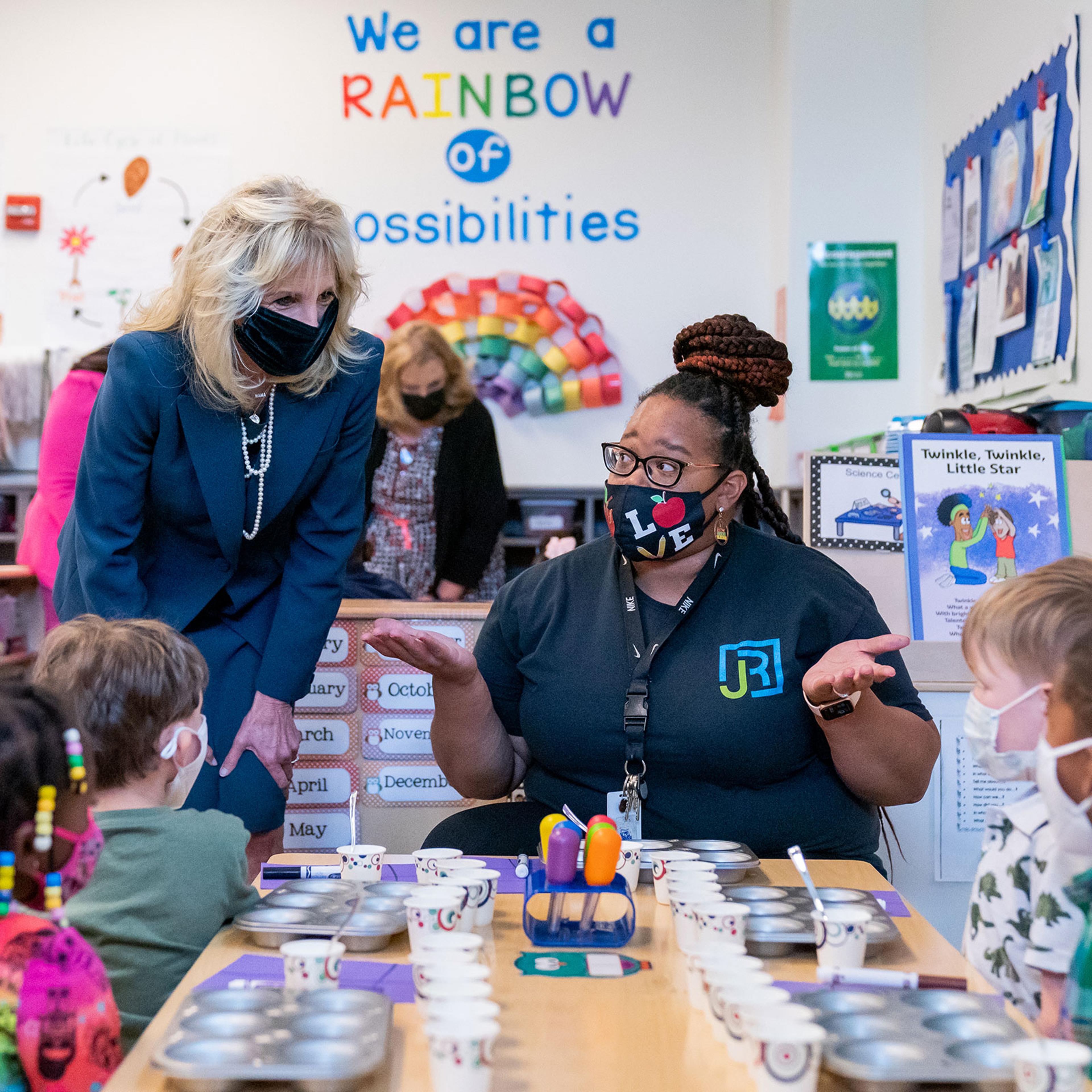Biden with a Head Start teacher and children in Alabama in 2021