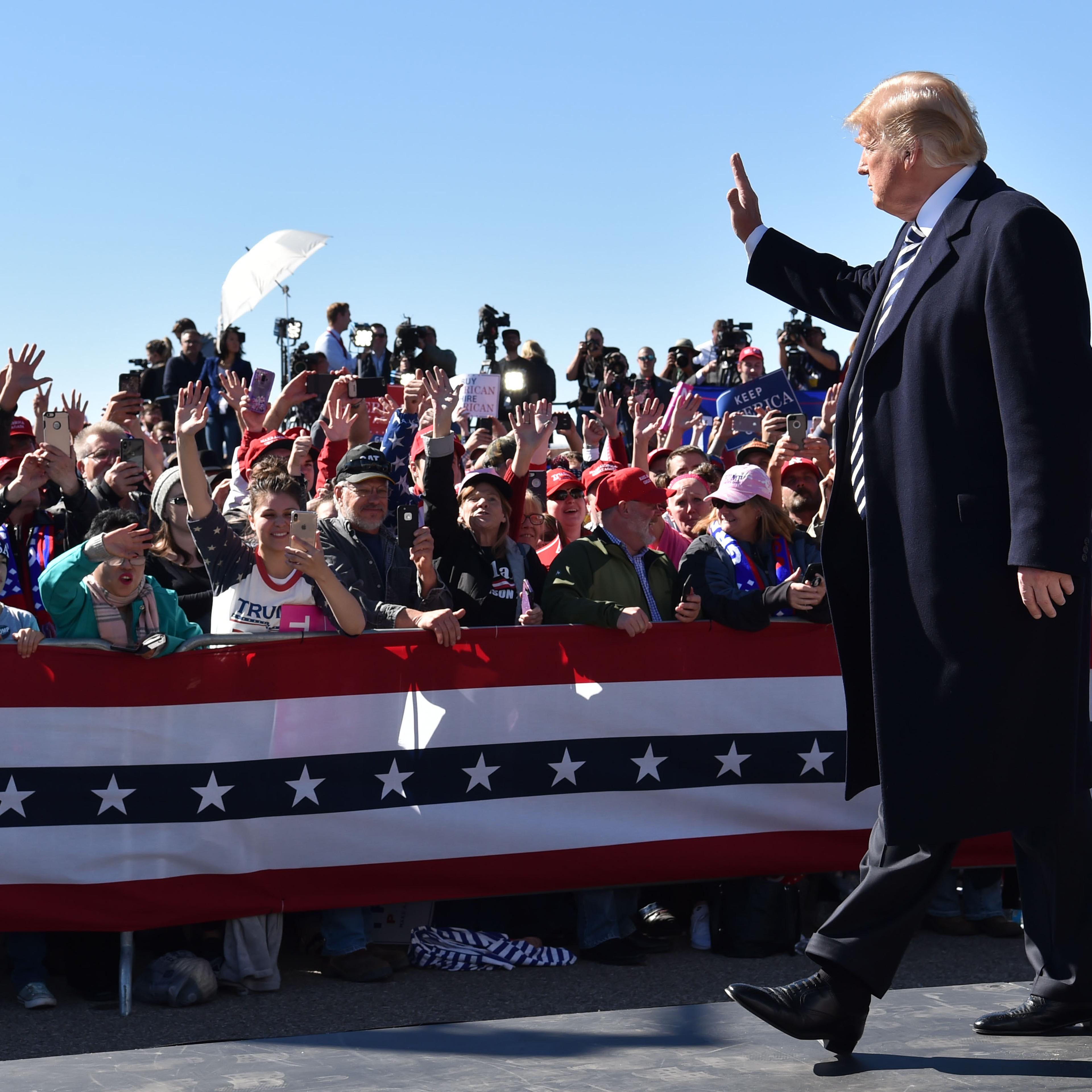 US President Donald Trump arrives for a "Make America Great Again" rally at Elko Regional Airport