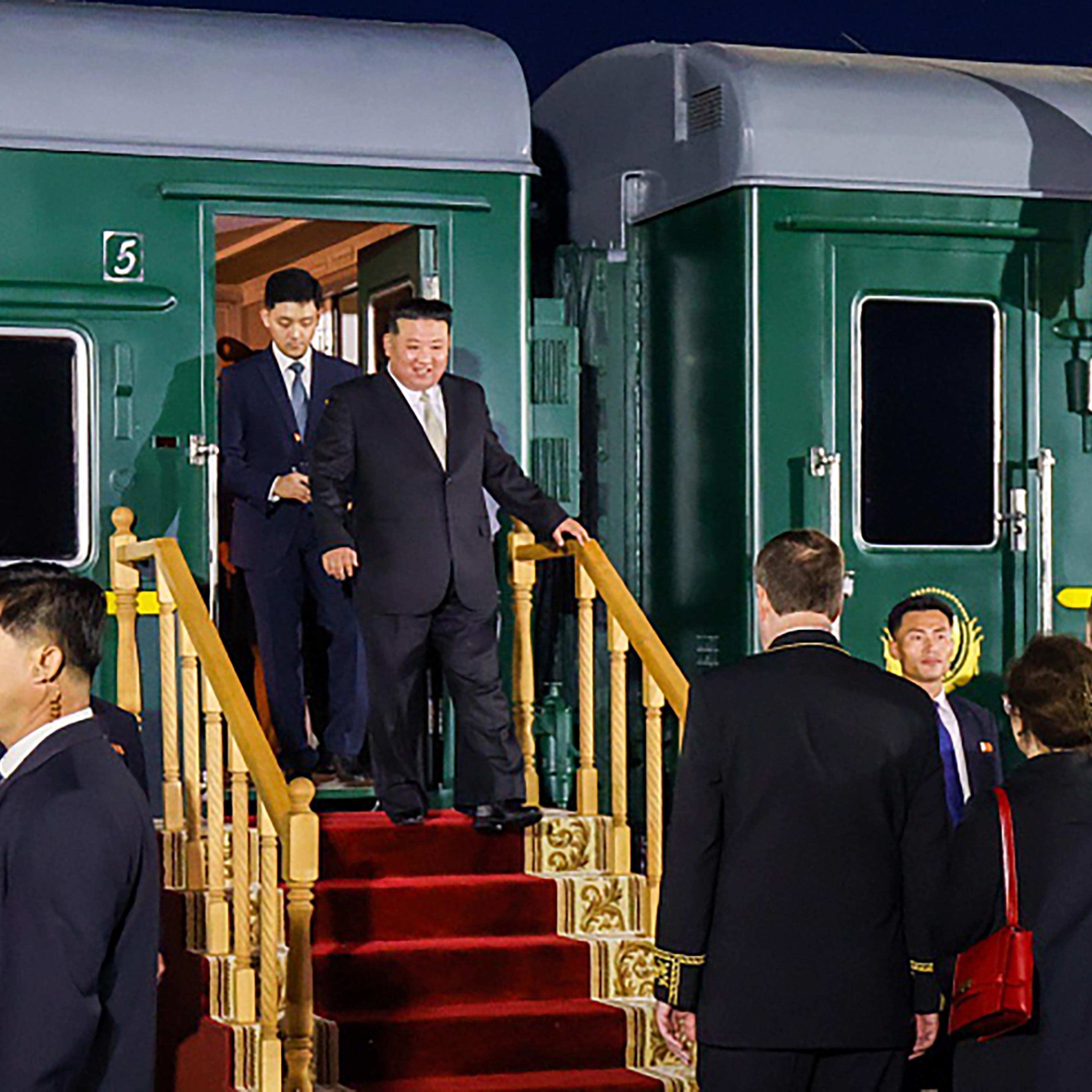North Korea leader Kim Jong Un is welcomed by Minister of Natural Resources and Ecology of Russia Alexander Kozlov after arriving at Vladivostok by armored train to attend a meeting with Russian President Vladimir Putin (not seen) in Vladivostok, Russia, on Sept. 12.