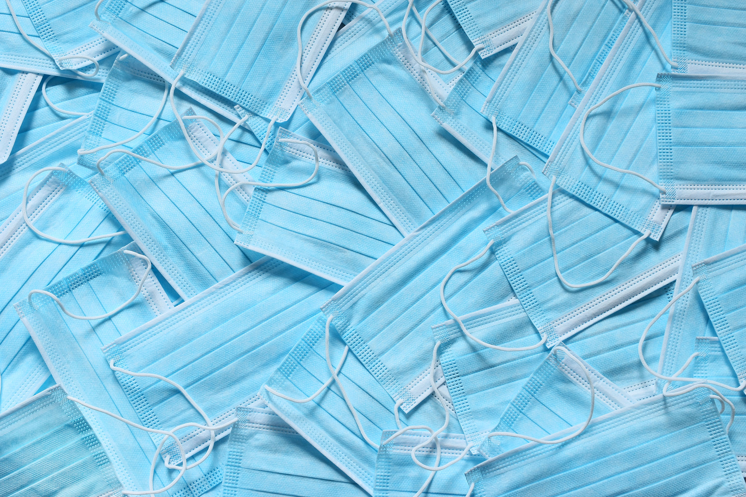 a pile of medical face masks
